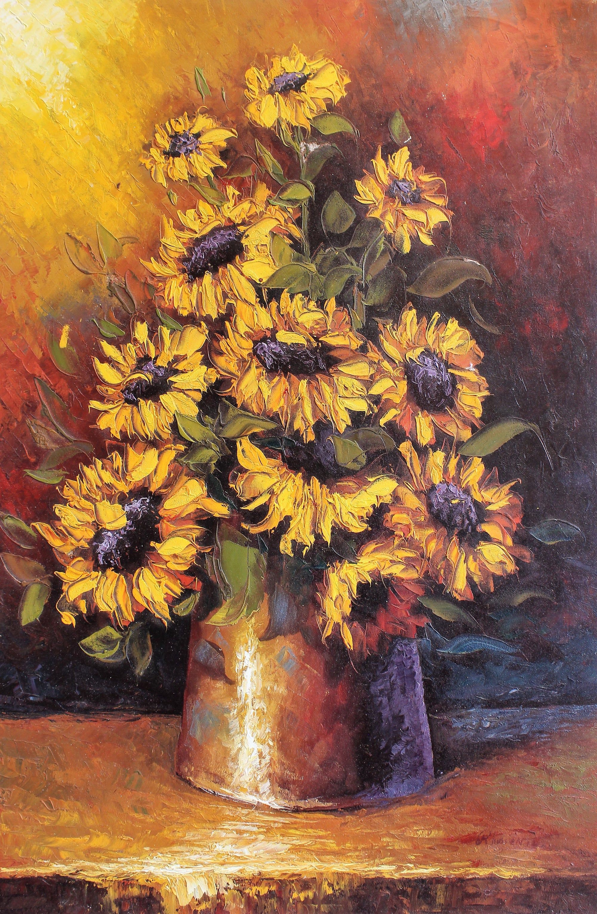 Nature morte de tournesols dans un vase en métal