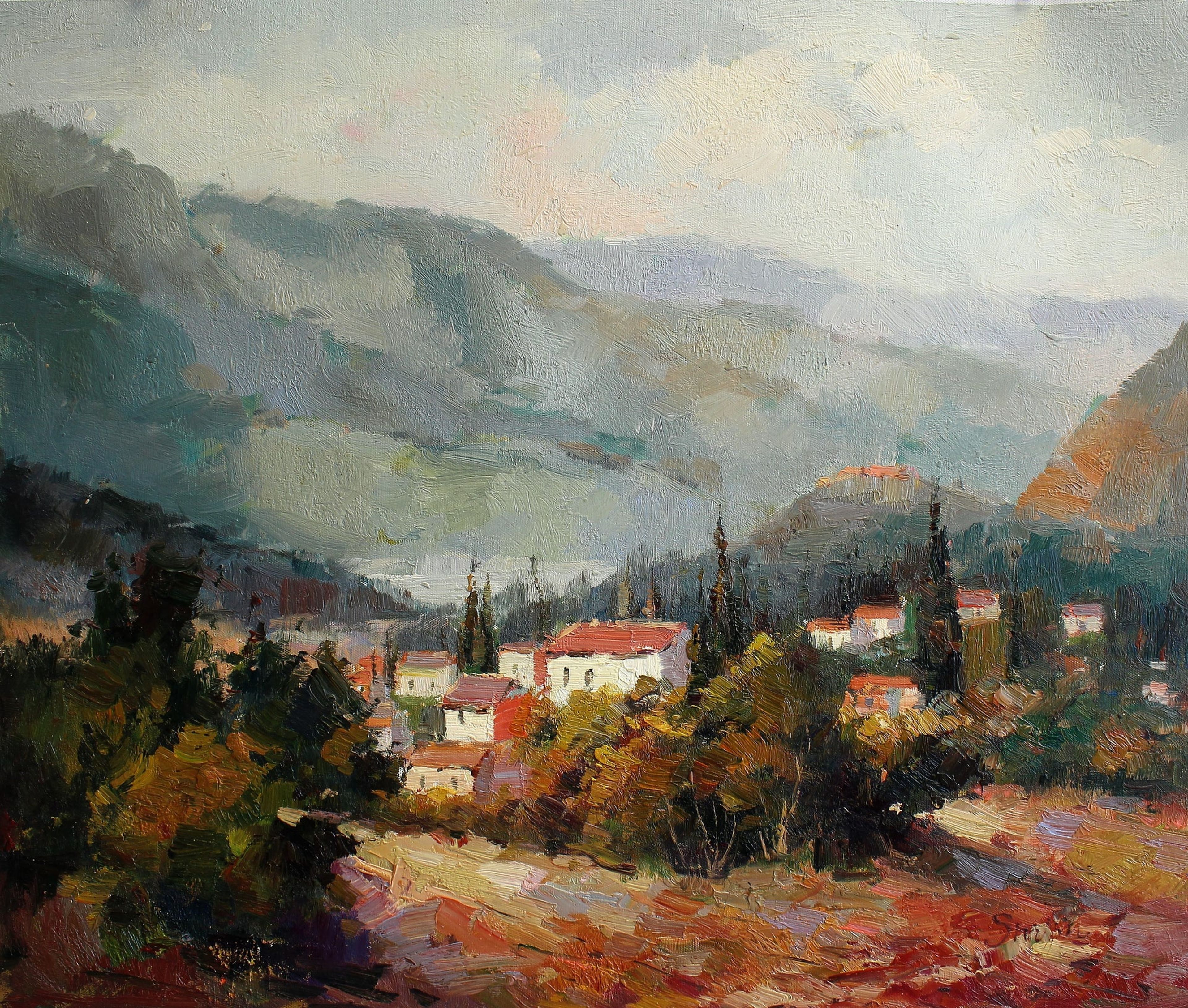Small village surrounded by mountains