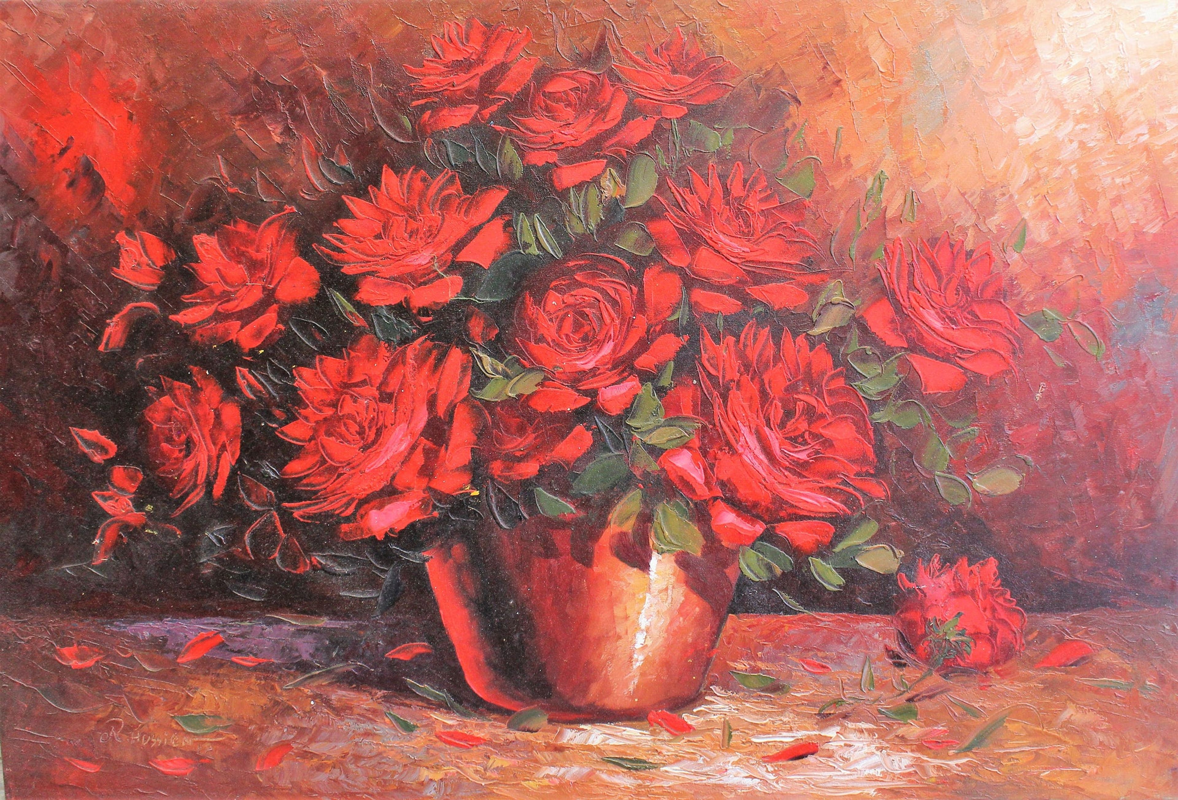 Roses rouges dans un vase rouge