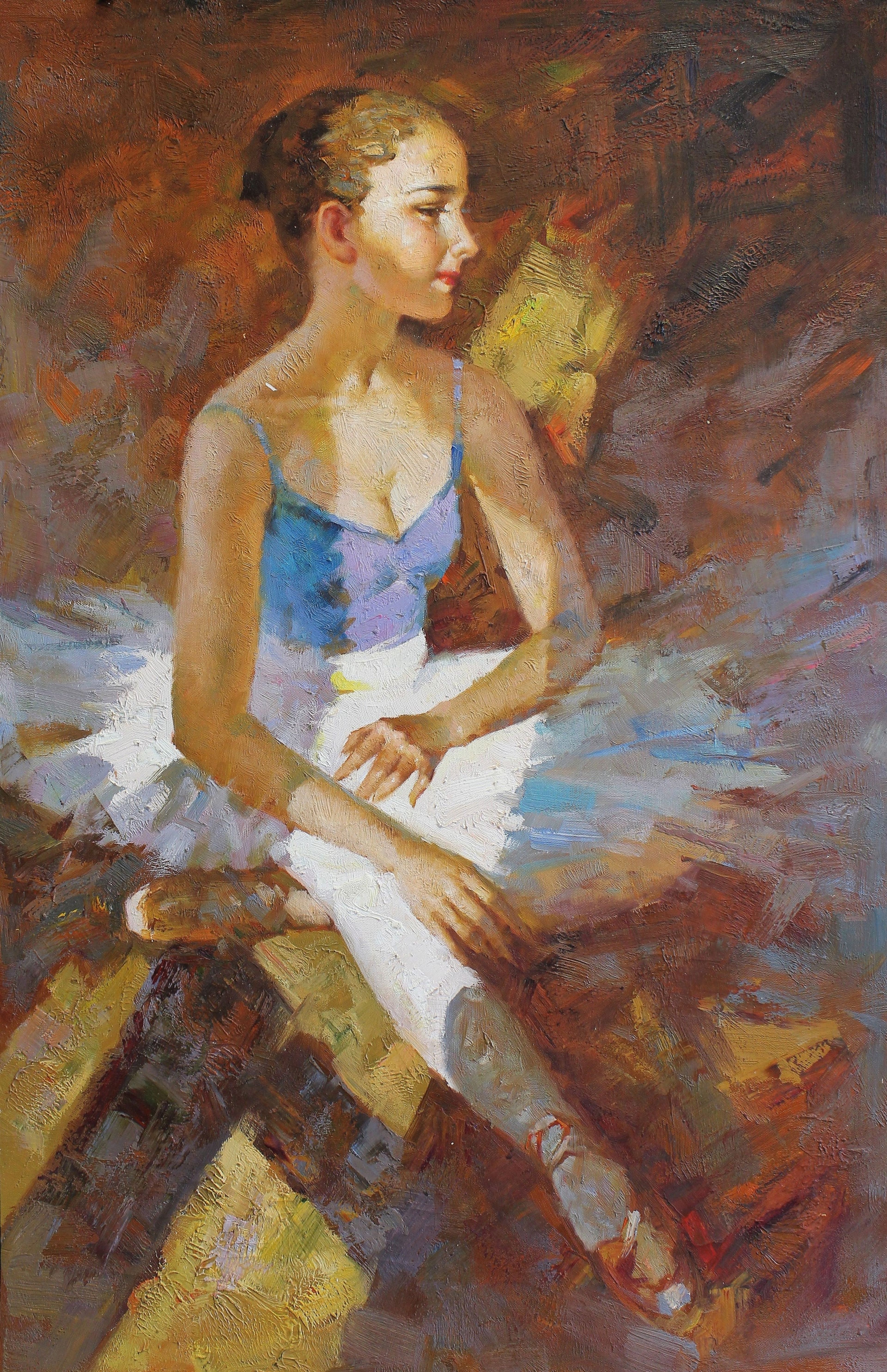 Ballerine assise sur le sol