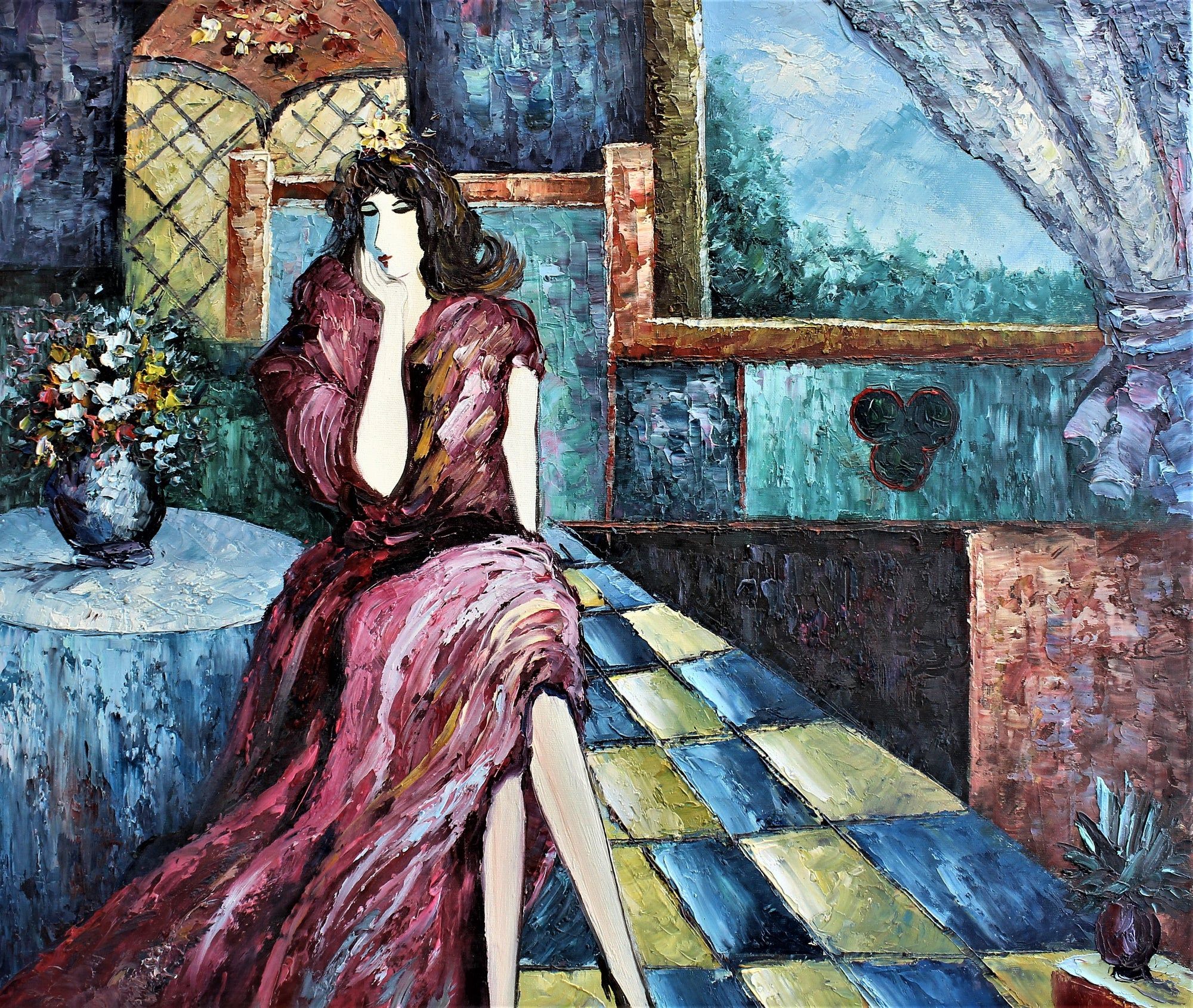 Femme assise à une table à manger
