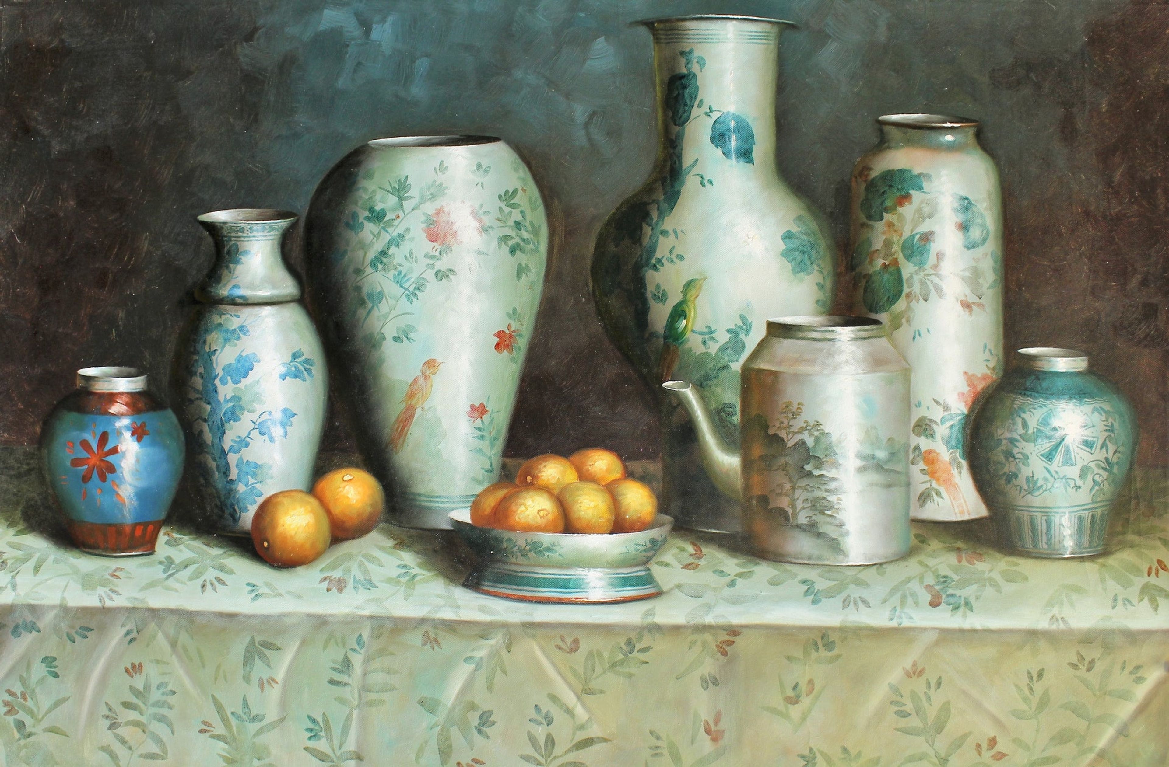 Nature morte de poterie et d'oranges
