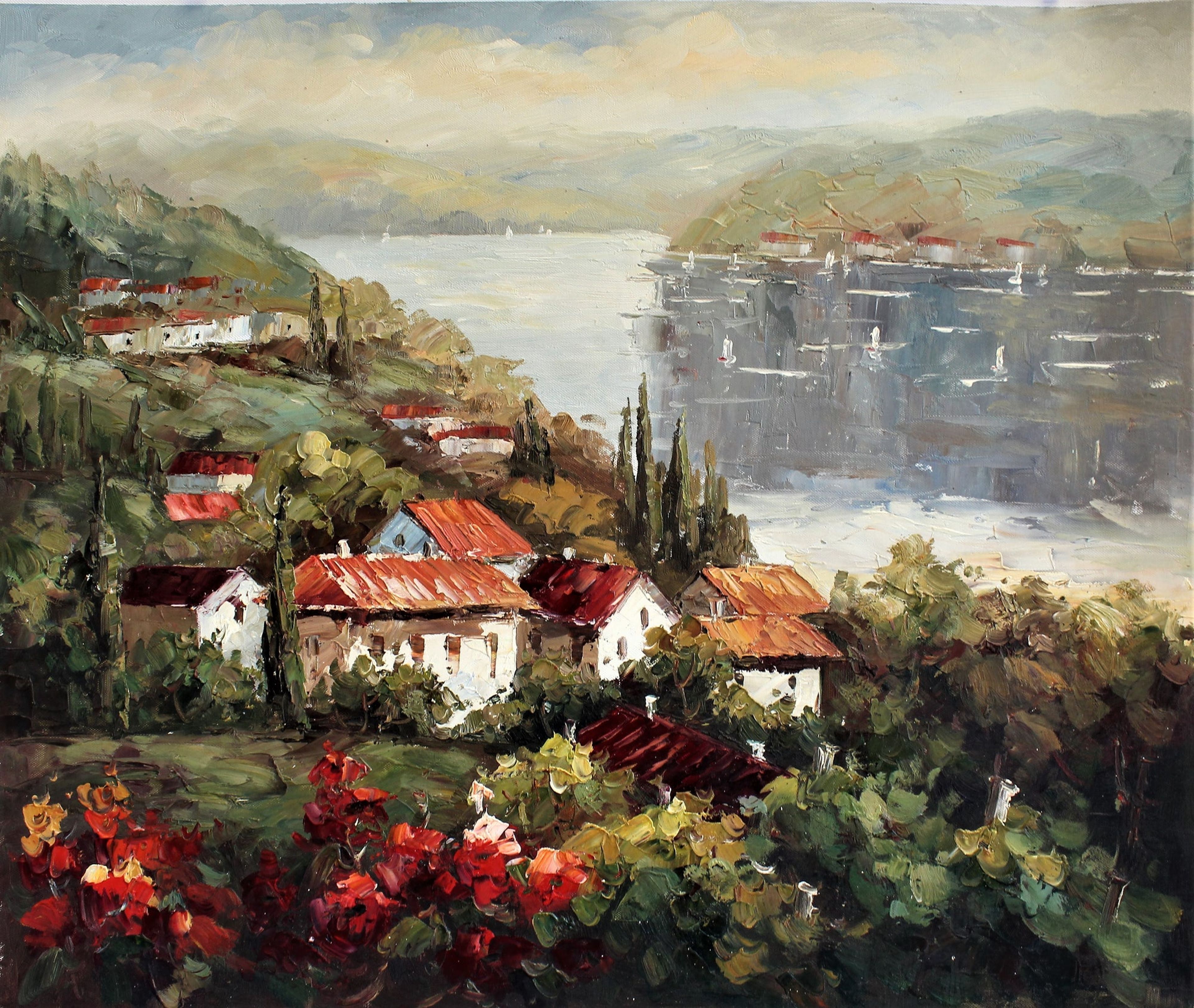 Village au bord d'un lac avec des bateaux