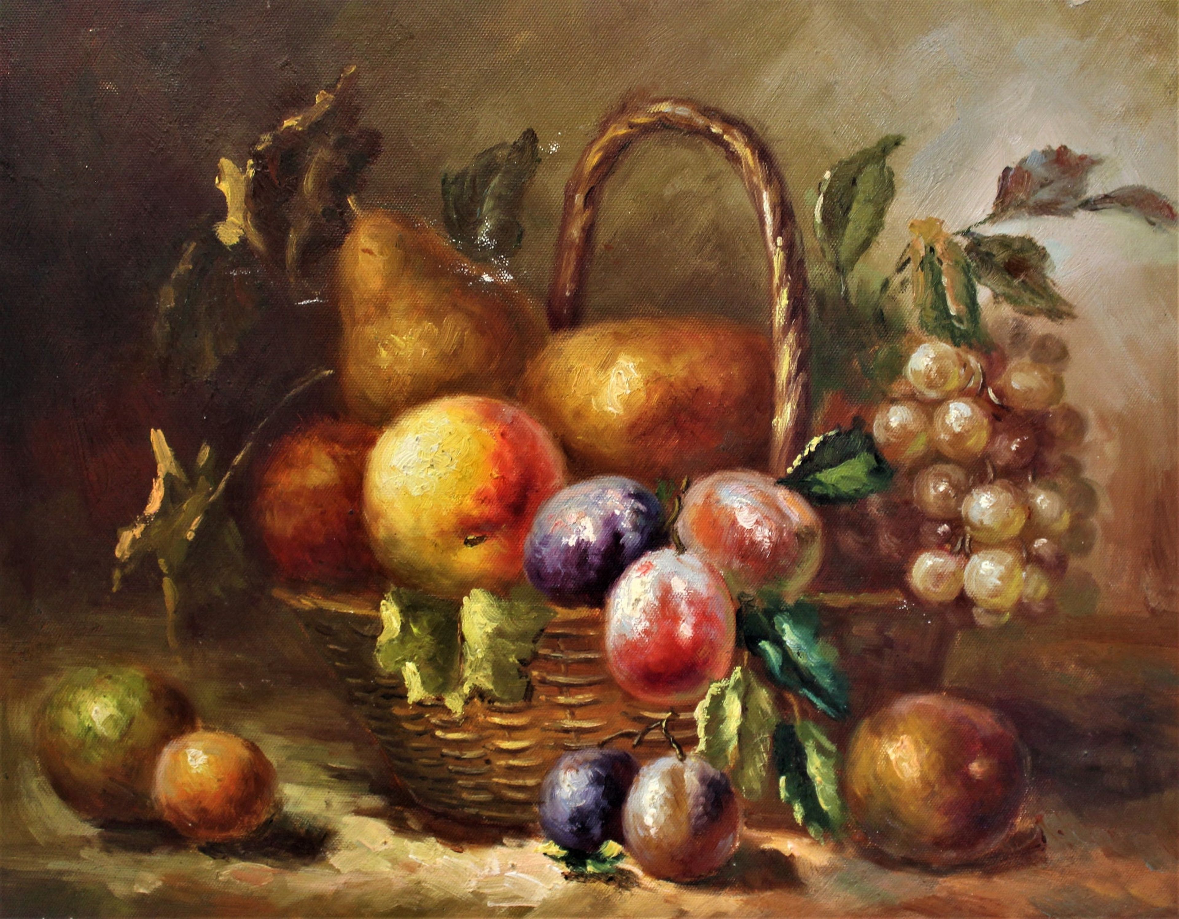 Nature morte de fruits et de feuilles dans un panier tressé