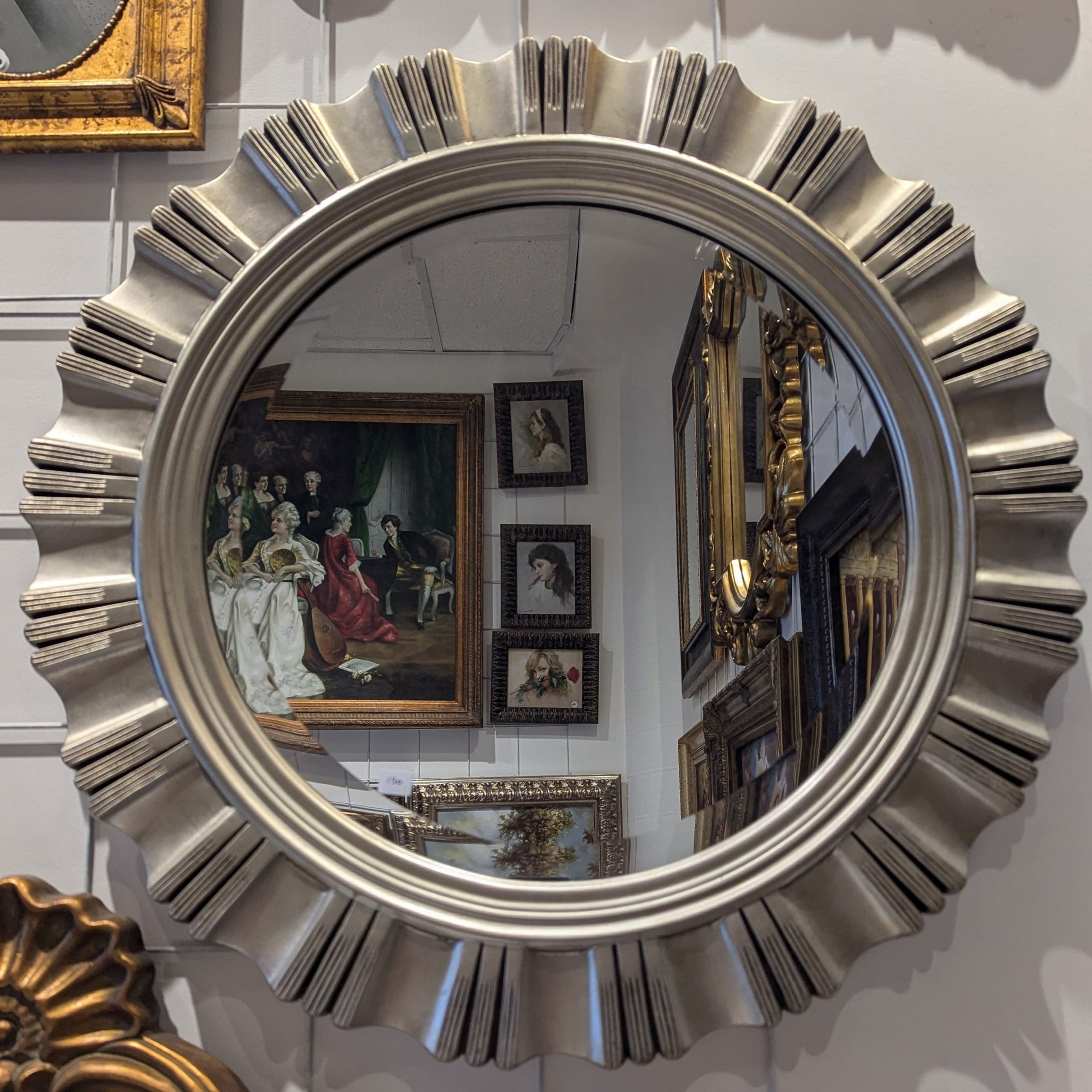 Miroir rond orné en argent