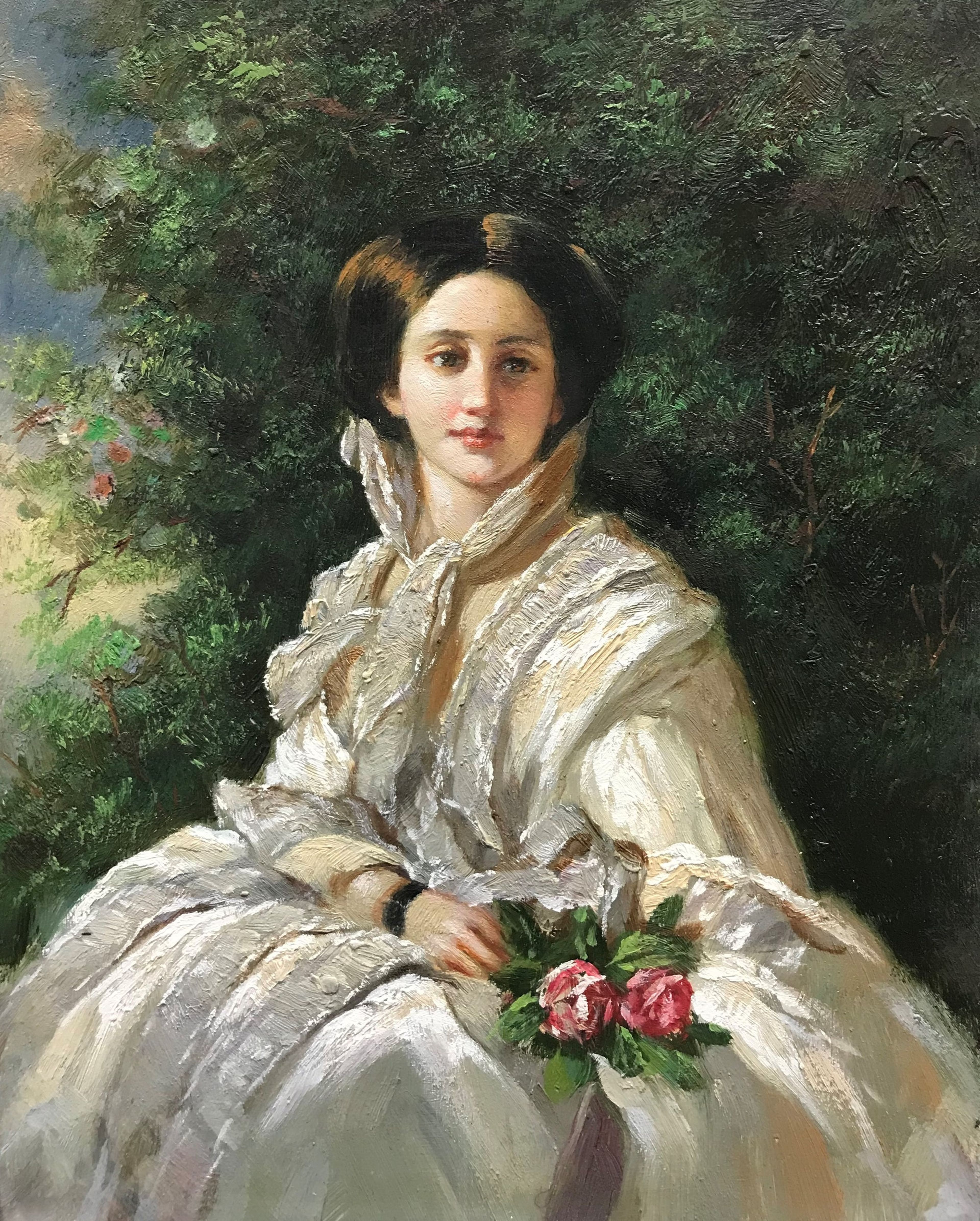 Femme assise avec un bouquet de fleurs