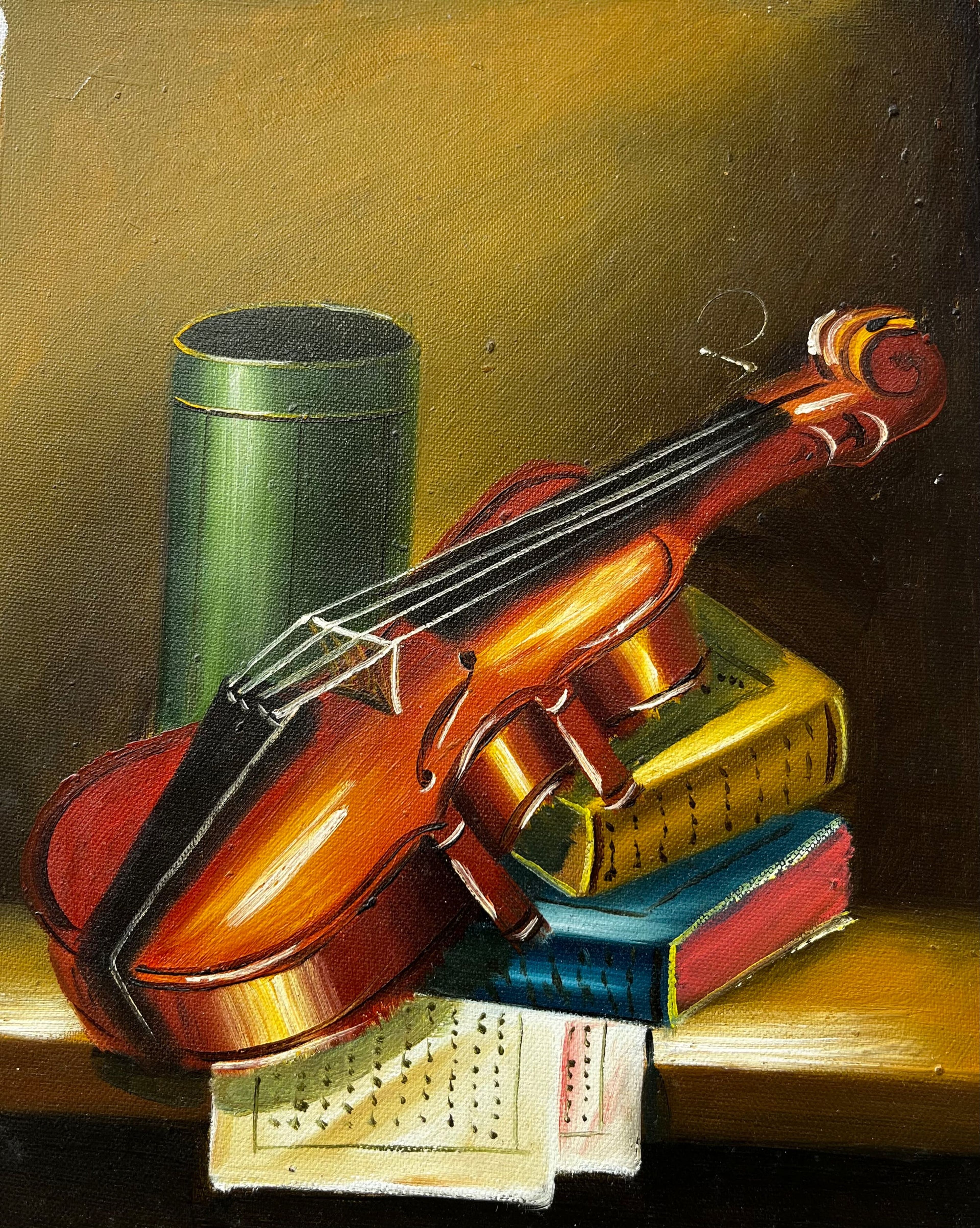 Nature morte de violon sur des livres
