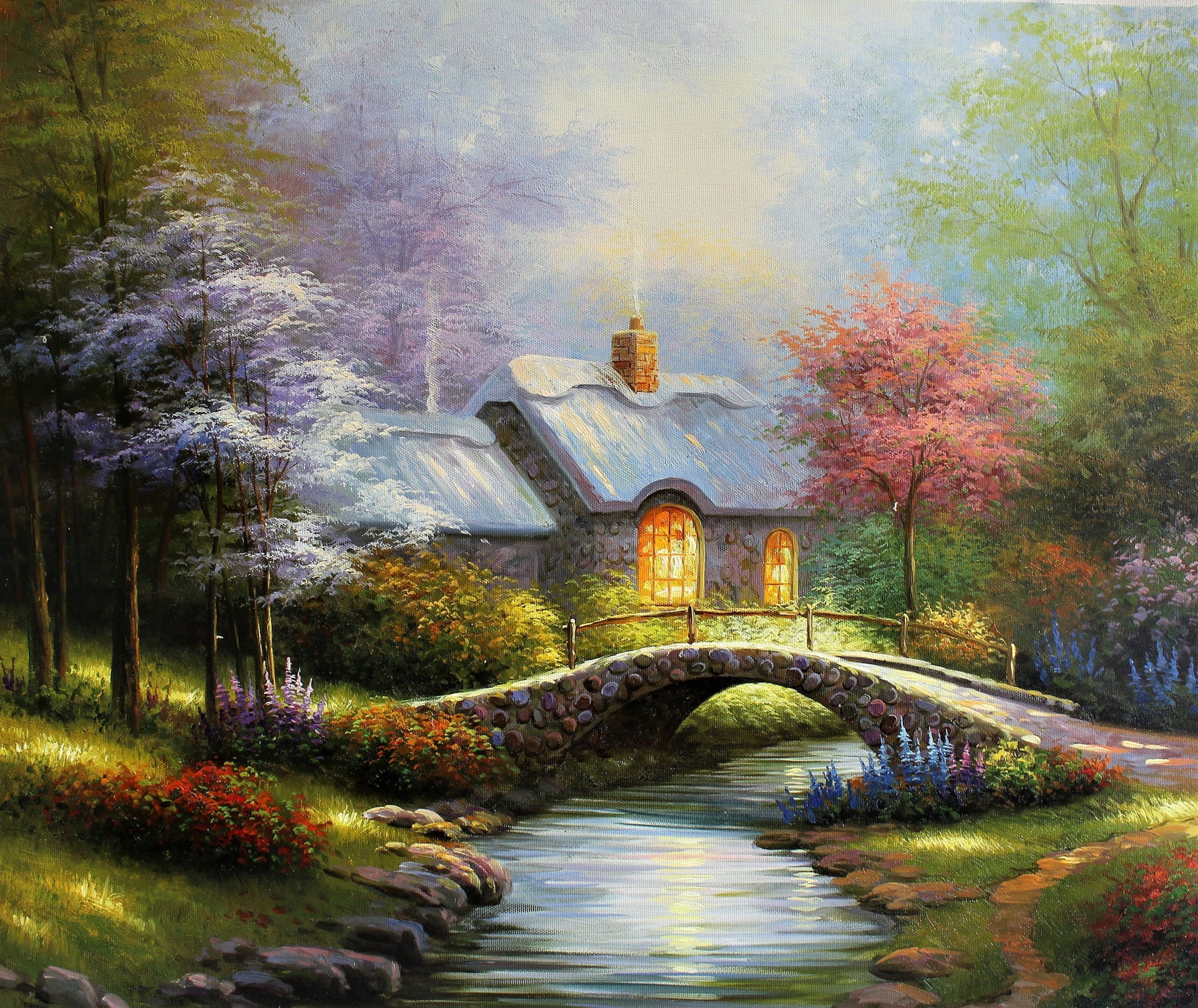 Pont vers un chalet dans les bois