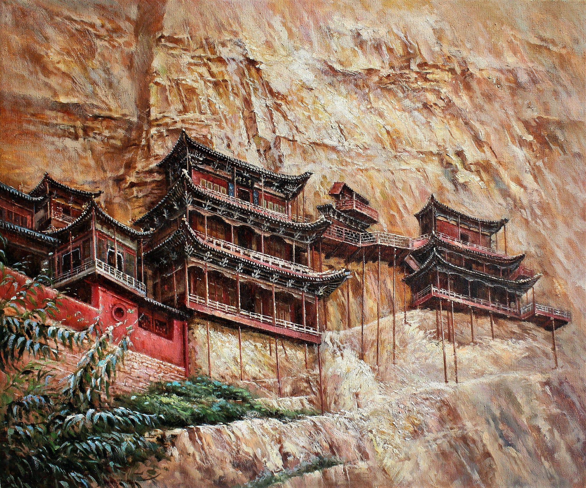 Bâtiments asiatiques construits à flanc de falaise