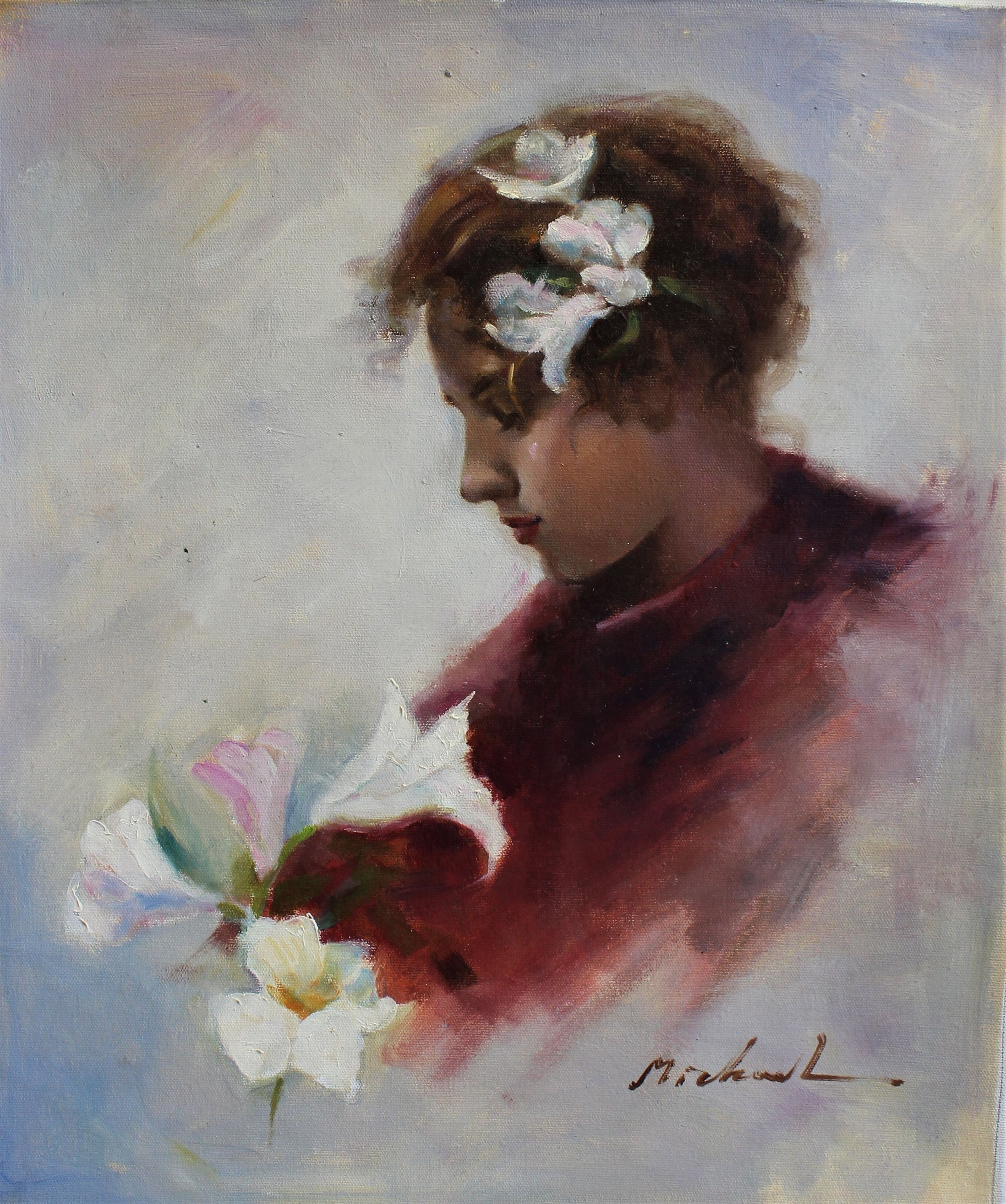 Portrait de profil d'une femme avec des fleurs blanches