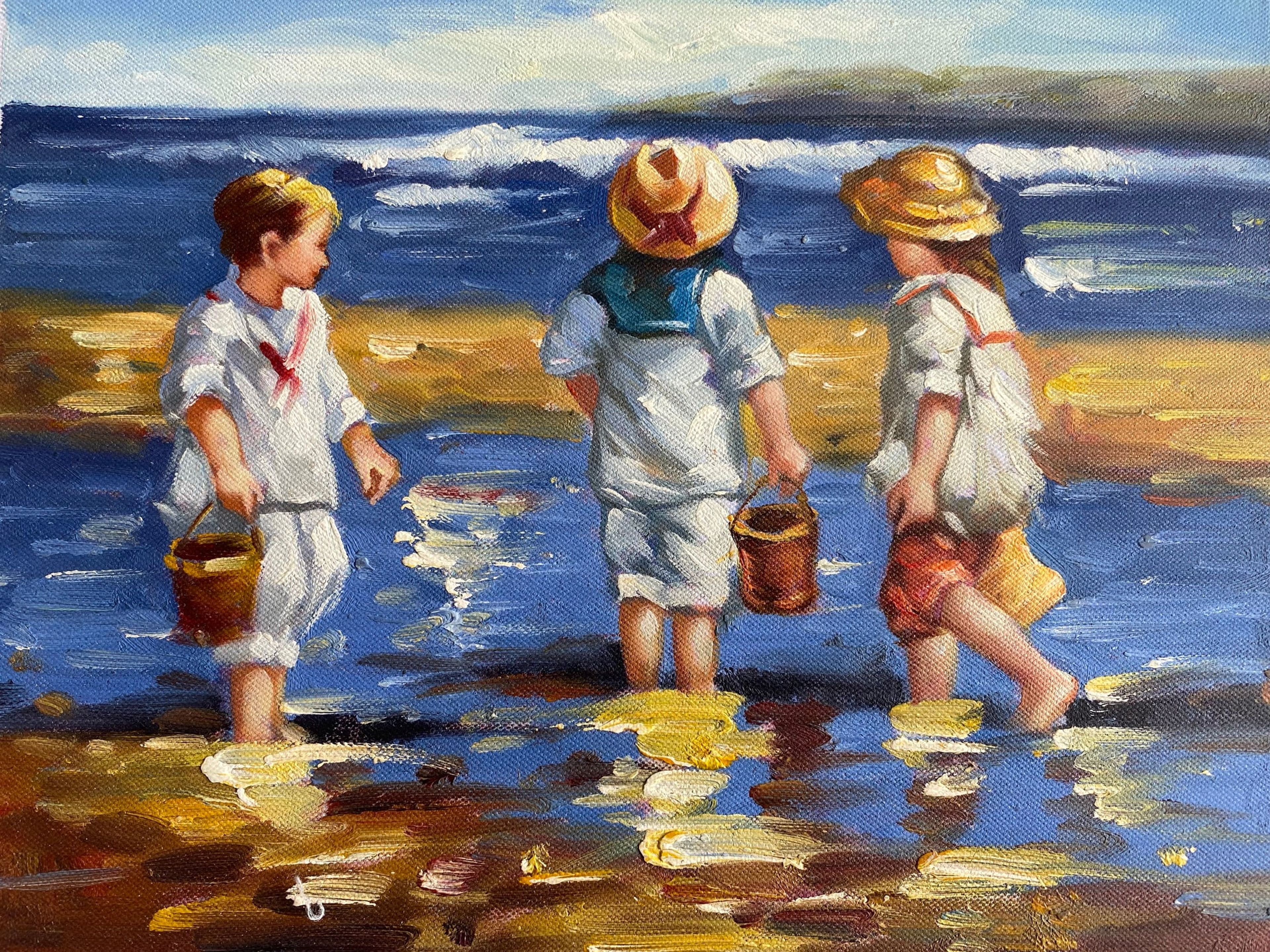 Trois enfants jouant dans l'eau