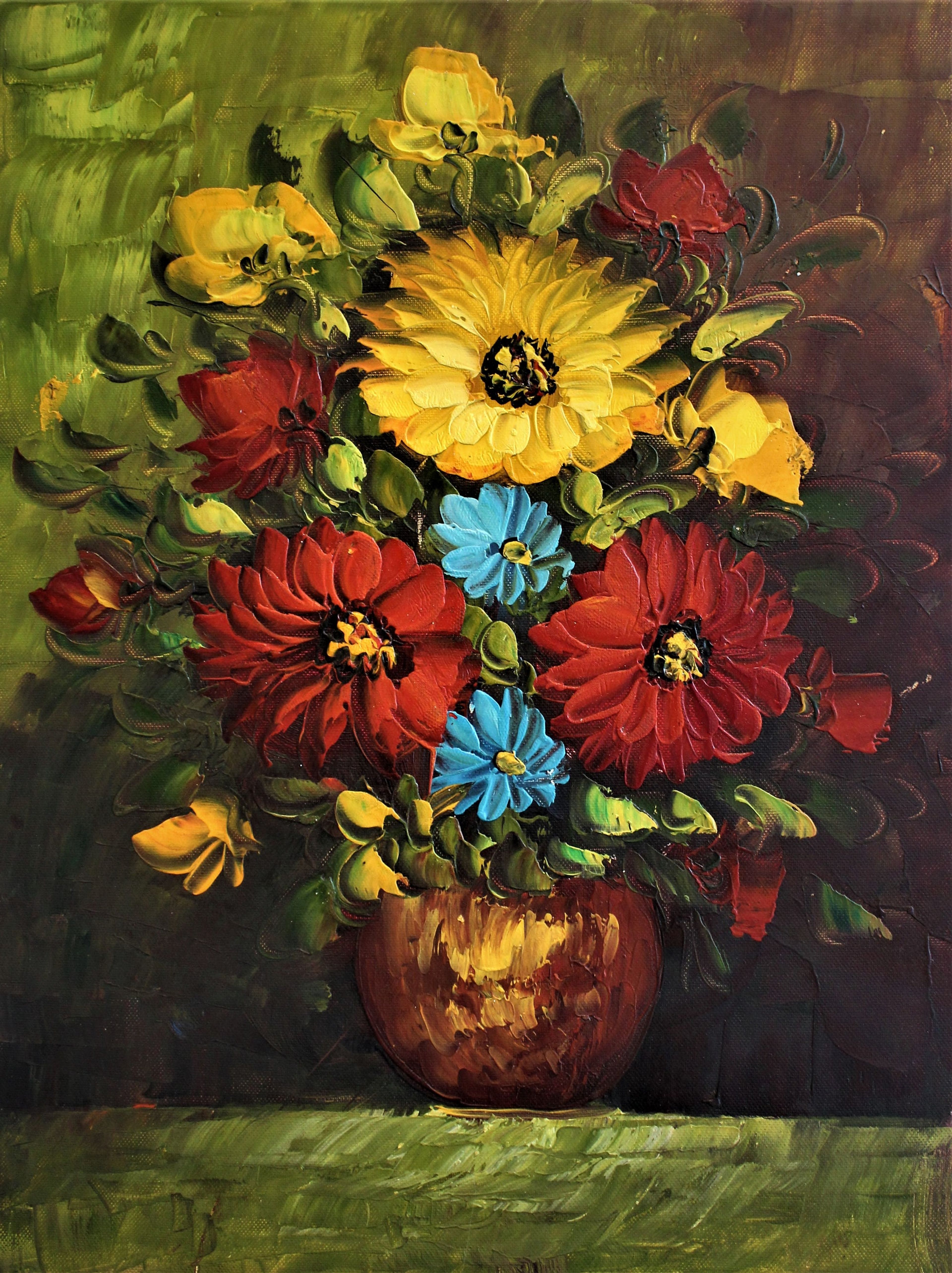 Bouquet de fleurs jaunes, rouges et bleues