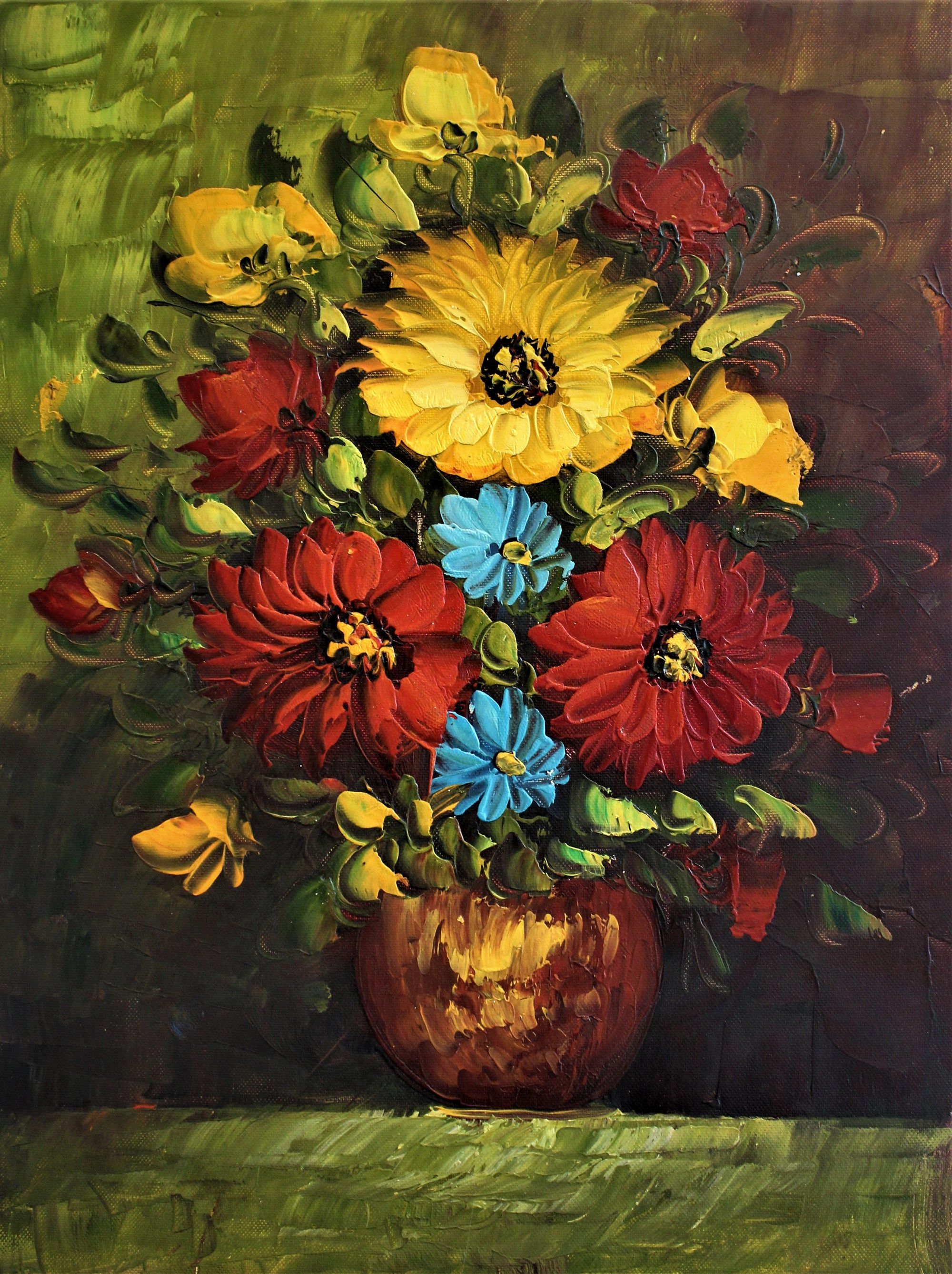 Bouquet de fleurs jaunes, rouges et bleues