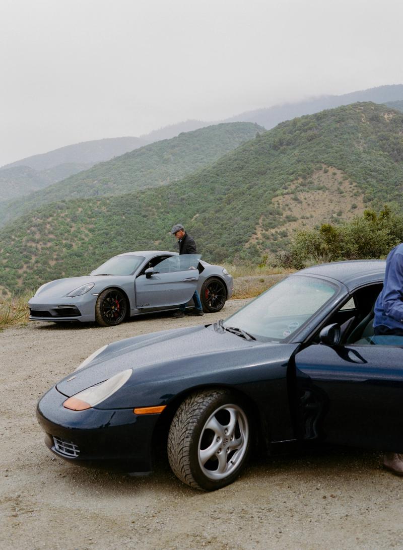 Two sports cars pulled over on a mountain turnout along California State Route 33.