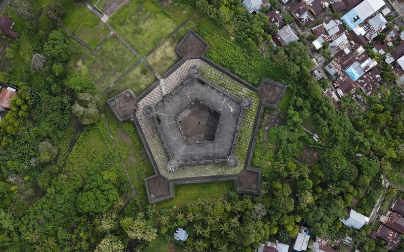 The pentagonal walls of Fort Belgica from above, with the town of Banda Neira and its nutmeg gardens around it