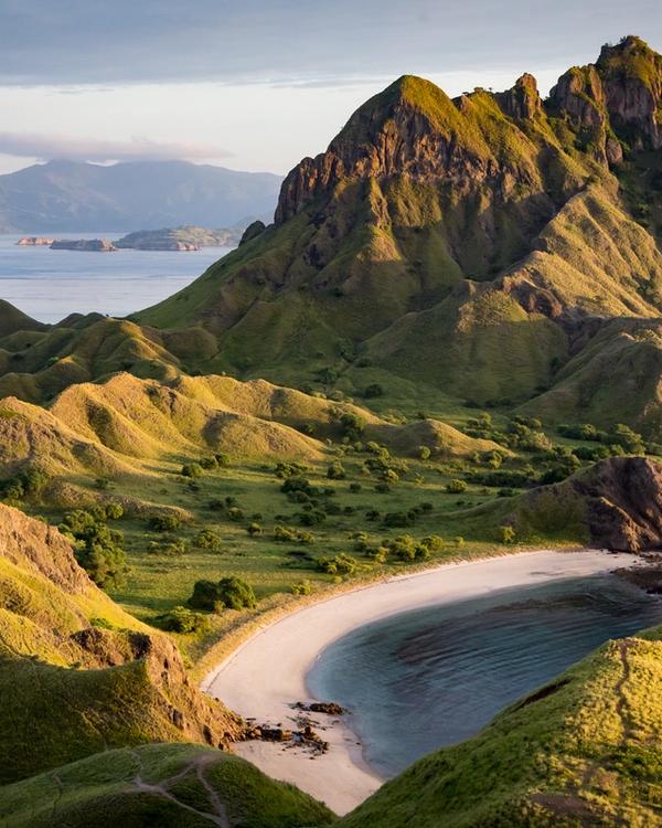 Padar Island at first light, with its curved bays and empty ridgeline in Komodo National Park