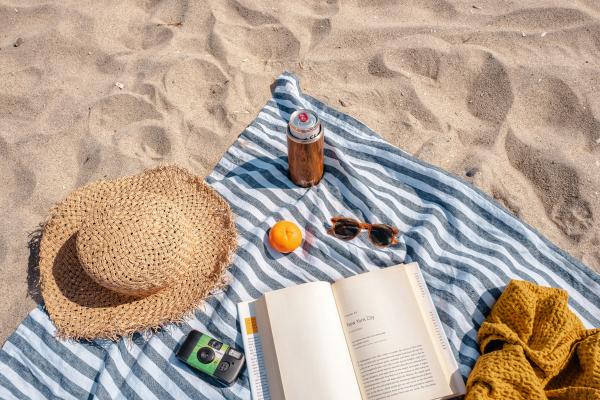 Couple on a quiet beach in Lombok on a honeymoon by the Gili Islands