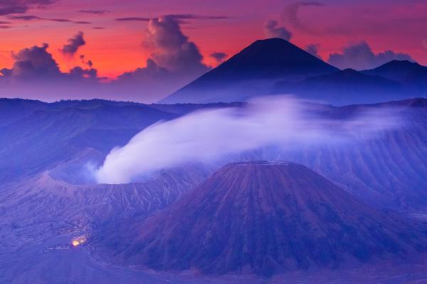 Mount Bromo at sunrise, its crater smoking inside the Tengger caldera, East Java