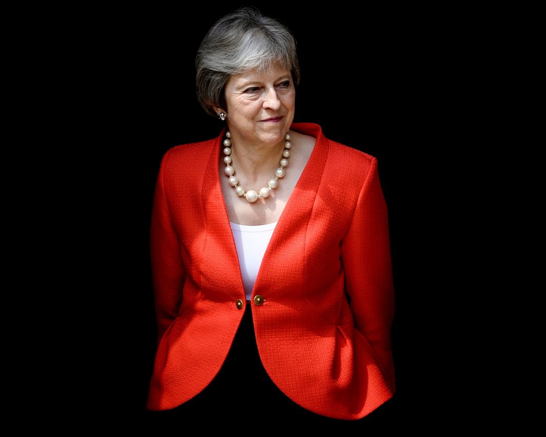 (FILES) In this file photo taken on July 13, 2018 Britain's Prime Minister Theresa May waits for the arrival of US President Donald Trump for a meeting at Chequers, the prime minister's country residence, near Ellesborough, northwest of London on the second day of Trump's UK visit. 
 Prime Minister Theresa May faces potentially highly damaging attacks from both sides in parliament this week of mid-July, 2018, over plans for Britain's future trading relationship with the EU after Brexit. / AFP PHOTO / Brendan Smialowski