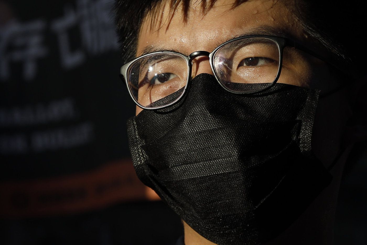 Hong Kong activist Joshua Wong announces his plan to run for the upcoming Legislative Council elections, in Hong Kong, Friday, June 19, 2020. China’s top legislative body has taken up a draft national security law for Hong Kong that has been strongly criticized as undermining the semi-autonomous territory’s legal and political institutions. (AP Photo/Kin Cheung)