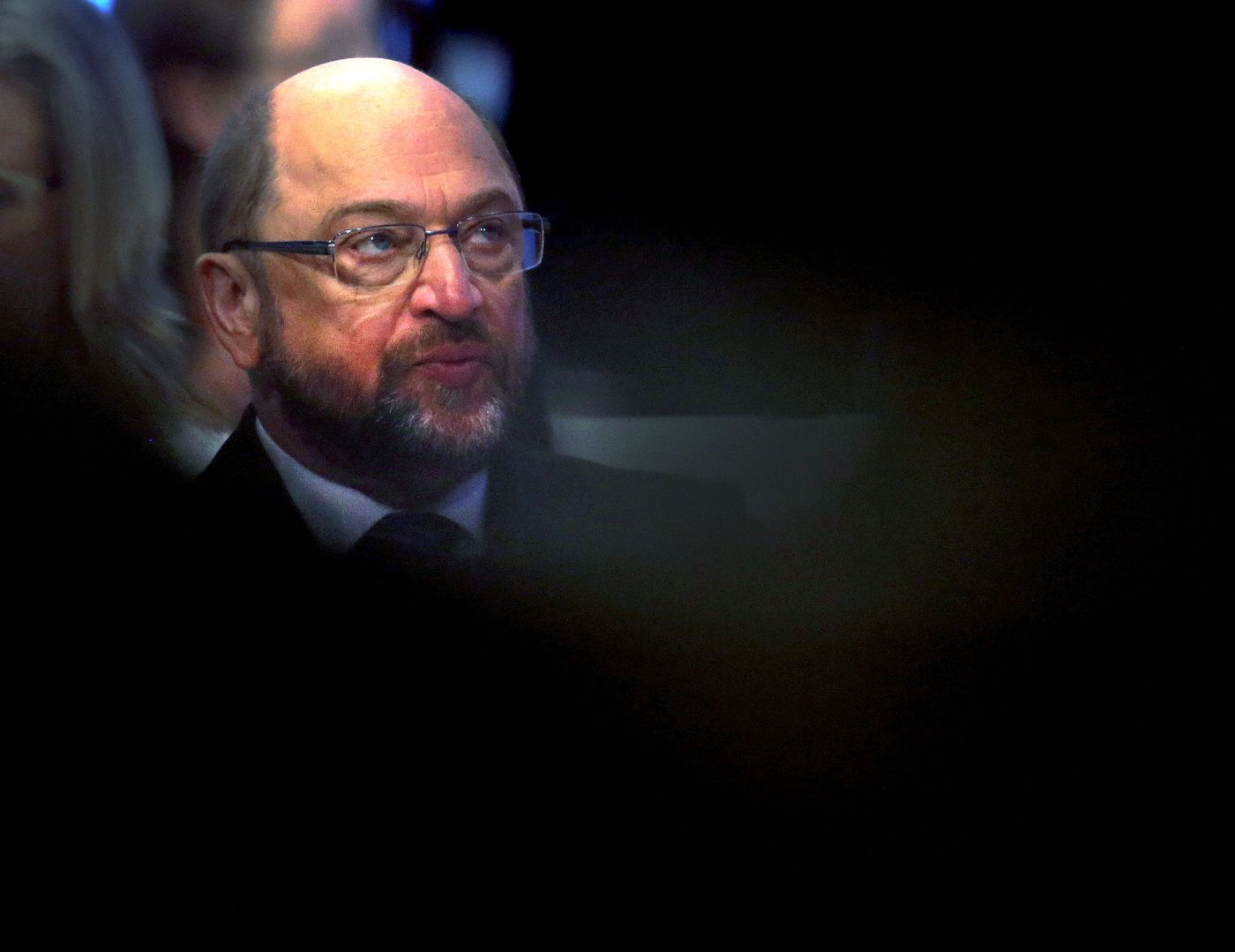 SPD leader Martin Schulz listens during a party meeting of the Social Democrats, SPD, who are discussing the possible coalition talks with Chancellor Angela Merkel's conservatives in Bonn, Germany, Sunday, Jan. 21, 2018. (AP Photo/Michael Probst)