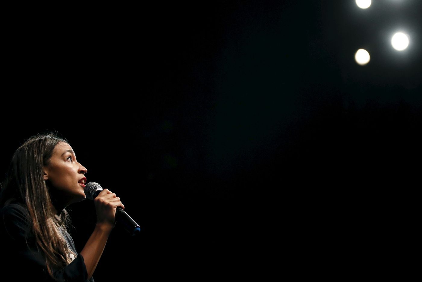 New York congressional candidate Alexandria Ocasio-Cortez addresses supporters at a fundraiser Thursday, Aug. 2, 2018, in Los Angeles. The 28-year-old startled the party when she defeated 10-term U.S. Rep. Joe Crowley in a New York City Democratic primary. (AP Photo/Jae C. Hong)