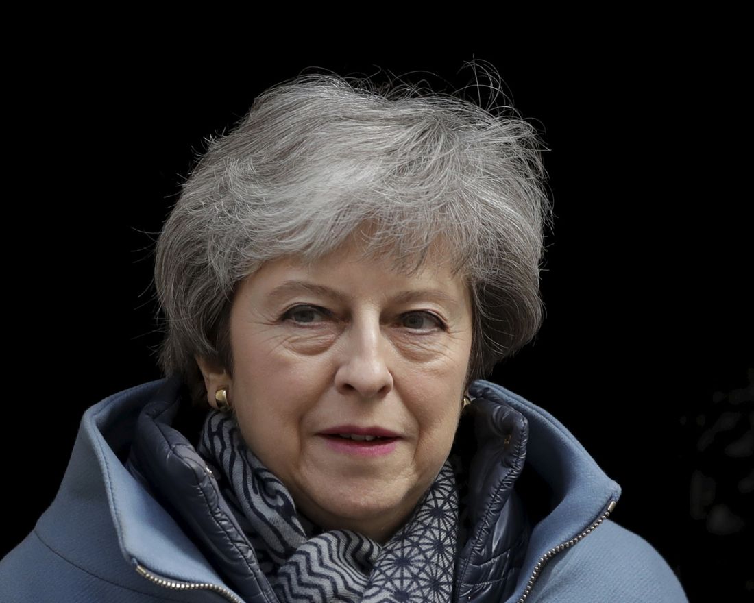 British Prime Minister Theresa May leaves 10 Downing Street in London, to attend the weekly Prime Minister's Questions at the Houses of Parliament, Wednesday, April 3, 2019. With Britain racing toward a chaotic exit from the European Union within days, May veered away from the cliff-edge Tuesday, saying she would seek another Brexit delay and hold talks with the opposition to seek a compromise. (AP Photo/Matt Dunham)