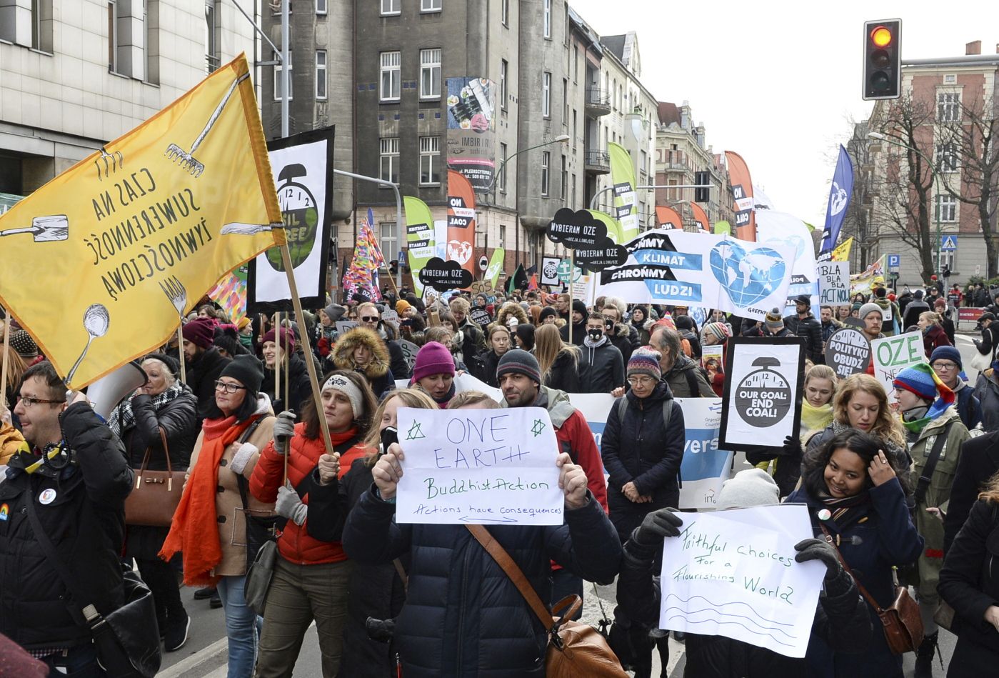 Climate activists attend the March for Climate in a protest against global warming in Katowice, Poland, Saturday, Dec. 8, 2018, as the COP24 UN Climate Change Conference takes place in the city. (AP Photo/Alik Keplicz)