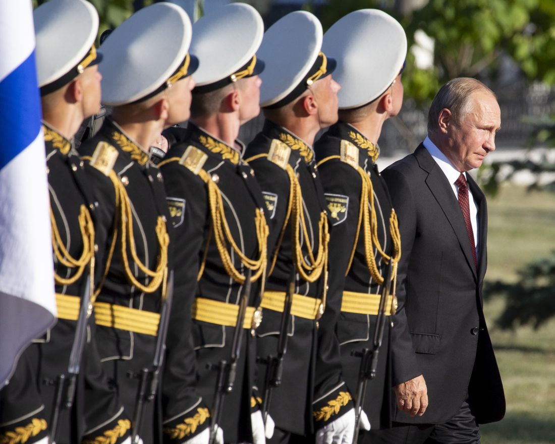 FILE - In this file photo taken on Thursday, Aug. 23, 2018, Russian President Vladimir Putin, right, arrives to attend a laying ceremony in Kursk, 426 kilometers (266 miles) south of Moscow, Russia. Putin may look like a winner after an abrupt U.S. decision to pull out of Syria, but the Russian leader faces massive challenges in Syria and elsewhere, and he hasn't moved an inch closer to the lifting of Western sanctions that have emaciated the national economy. (AP Photo/Alexander Zemlianichenko, Pool, File)