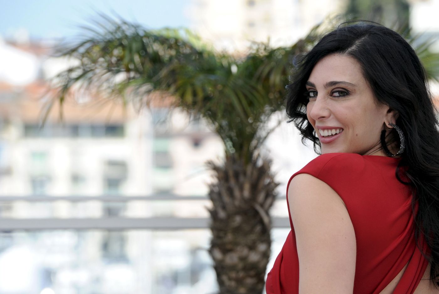 TO GO WITH STORY BY RANA MOUSSAOUI 
 (FILES) Lebanese director Nadine Labaki poses during the photocall of "Et Maintenant on Va Ou?" (Where do We Go Now) presented in the Un Certain Regard Selection at the 64th Cannes Film Festival on May 17, 2011 in Cannes. Flushed with the triumph of her latest film at the Toronto International Film Festival, Lebanese director Nadine Labaki is the toast of the town as she sits in a Beirut cafe giving interview after interview. 
 AFP PHOTO / ANNE-CHRISTINE POUJOULAT