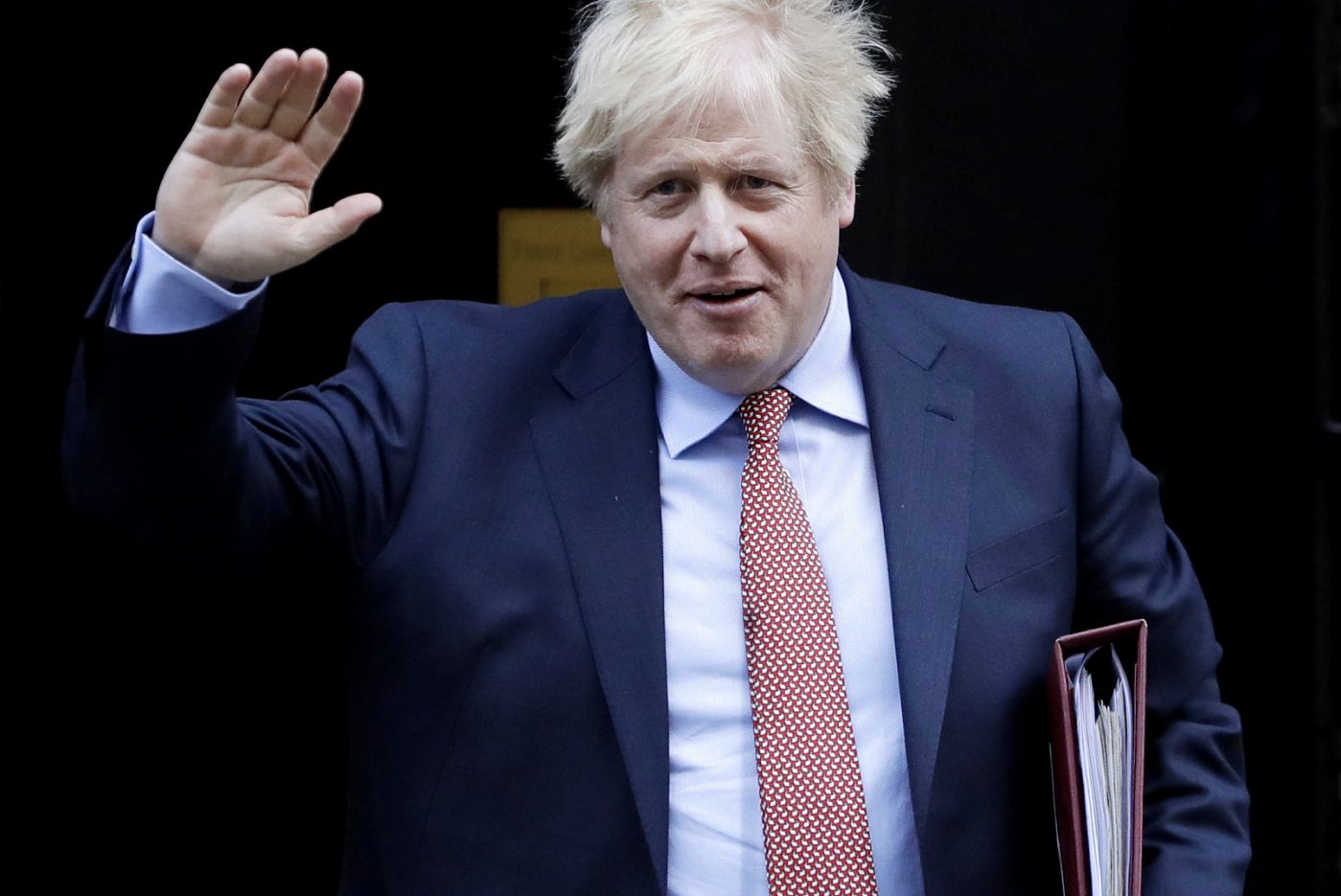 Britain’s Prime Minister Boris Johnson leaves 10 Downing Street to attend the weekly session of Prime Ministers Questions in Parliament in London, Wednesday, Jan. 29, 2020. Britain officially leaves the European Union on Friday after a debilitating political period that has bitterly divided the nation since the 2016 Brexit referendum. (AP Photo/Kirsty Wigglesworth)