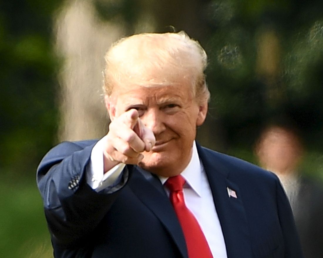 US President Donald Trump gestures as he prepares to board Marine One to depart the US ambassador's residence Winfield House in London on July 13, 2018. 
 US President Donald Trump launched an extraordinary attack on Prime Minister Theresa May's Brexit strategy, plunging the transatlantic "special relationship" to a new low as they prepared to meet Friday on the second day of his tumultuous trip to Britain. / AFP PHOTO / Brendan Smialowski