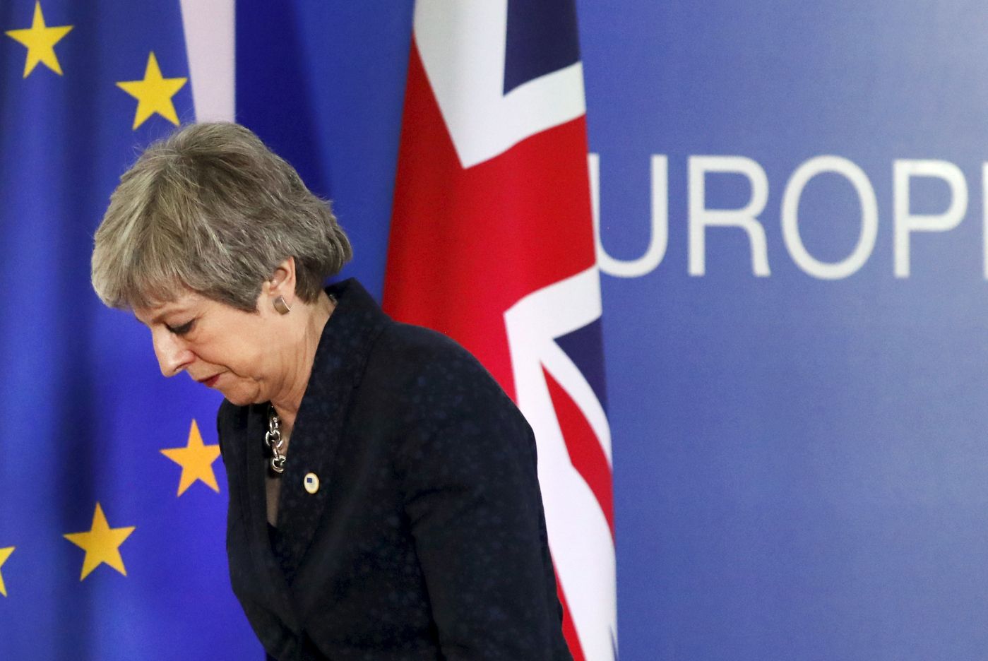 British Prime Minister Theresa May leaves after addressing a media conference at an EU summit in Brussels, Friday, March 22, 2019. Worn down by three years of indecision in London, EU leaders on Thursday were grudgingly leaning toward giving the U.K. more time to ease itself out of the bloc. (AP Photo/Frank Augstein)