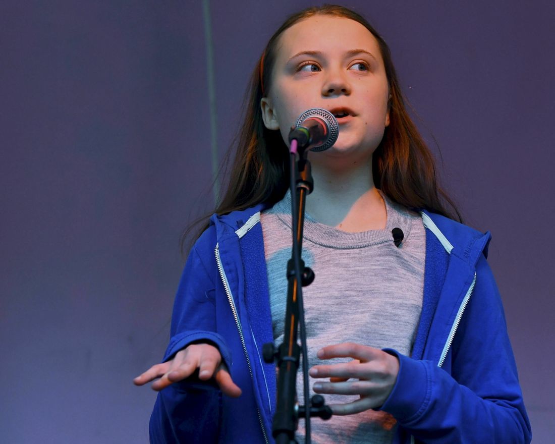 Swedish activist Greta Thunberg addresses the Extinction Rebellion demonstrators at Marble Arch in London, Sunday April 21, 2019. The group Extinction Rebellion is calling for a week of civil disobedience against what it says is the failure to tackle the causes of climate change. (Victoria Jones/PA via AP)