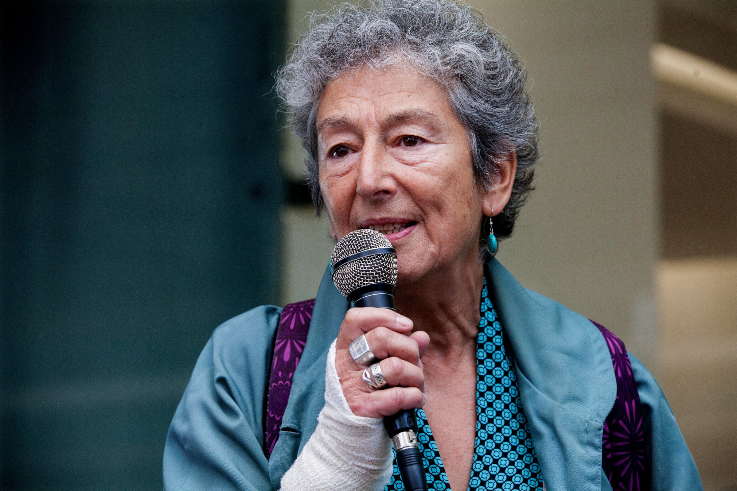 PJ66CT London, UK. 4th September, 2018. Naomi Wimborne-Idrissi of Jewish Voice for Labour addresses supporters of Jeremy Corbyn from Jewish Voice for Labour, Momentum and other groups campaigning outside the headquarters of the Labour Party on the day on which the party NEC was expected to adopt the IHRA definition and examples of anti-Semitism. Credit: Mark Kerrison/Alamy Live News