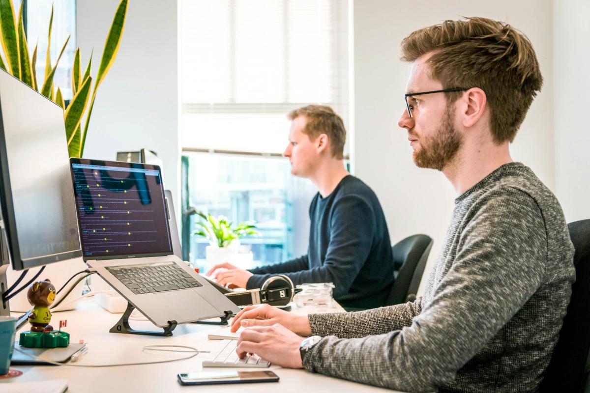 man working with coder - AI Workloads