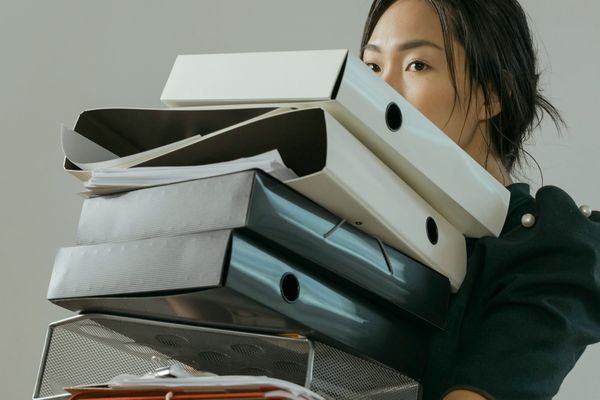 woman carrying books