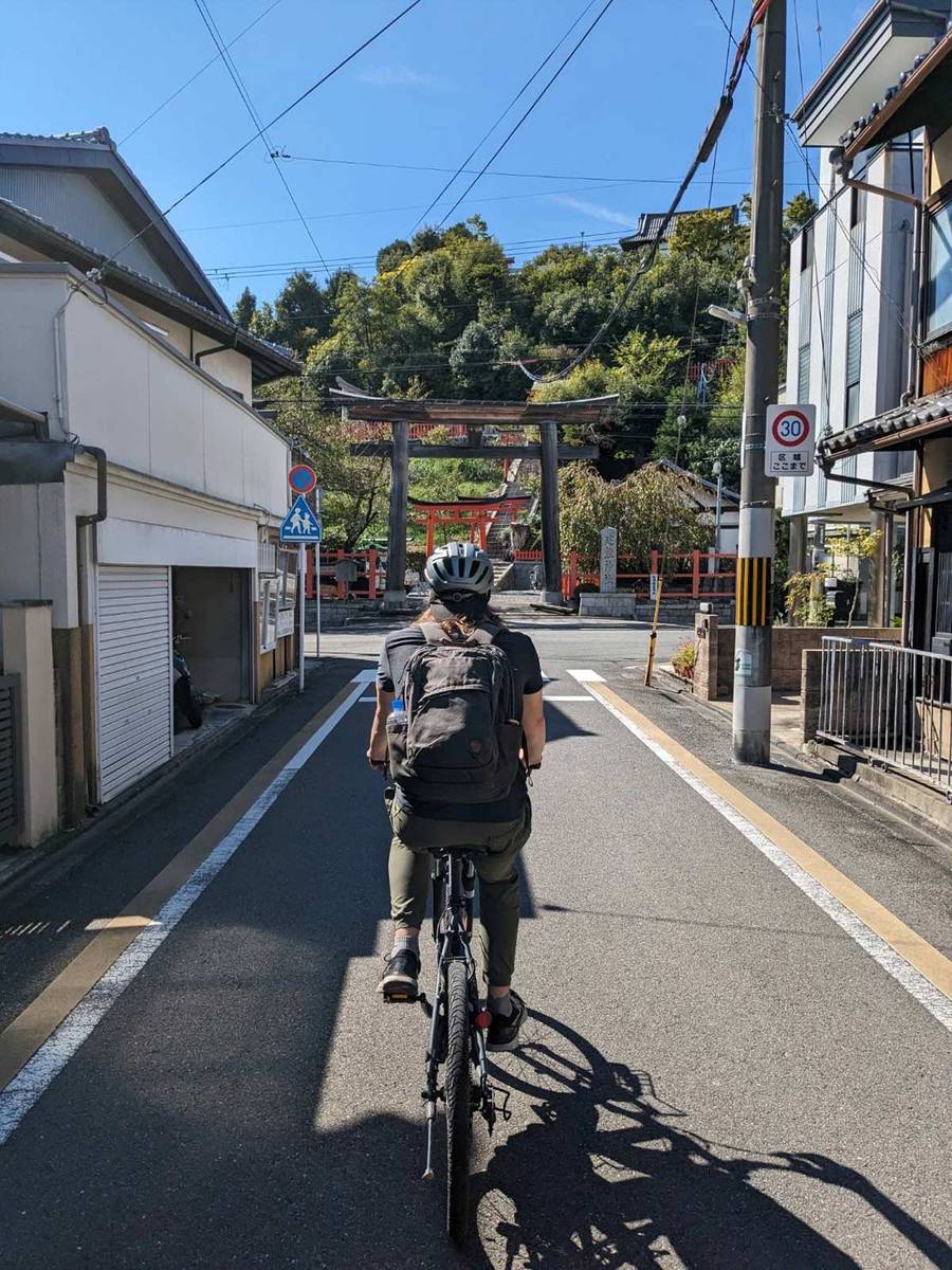 Cycling through local streets is a far more intimate experience than riding in a van or bus. 
