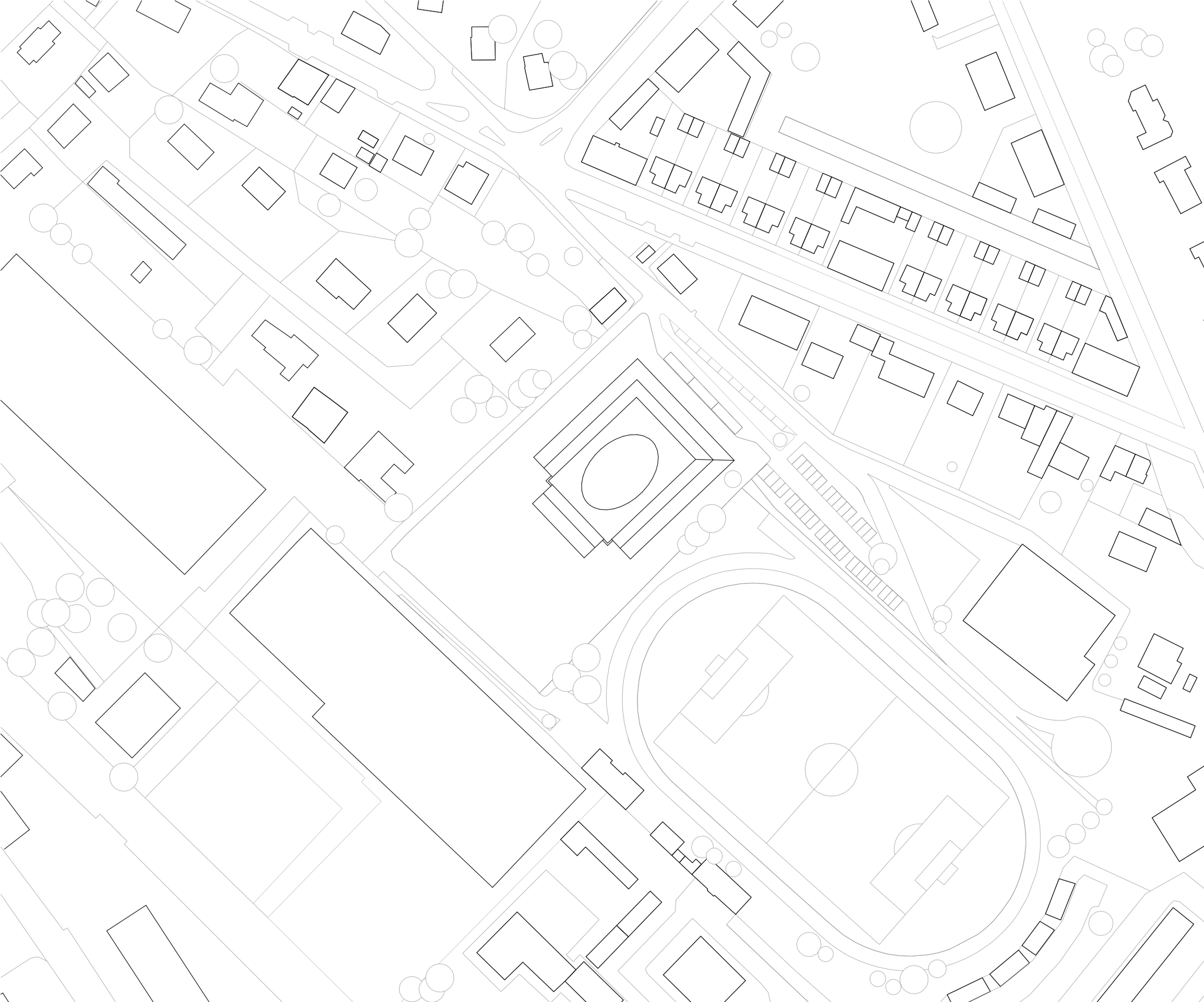 Plan masse de l’école élémentaire Hubert Reeves à Champagnole, montrant la cour elliptique en cœur d’îlot, les volumes compacts et les équipements sportifs voisins.