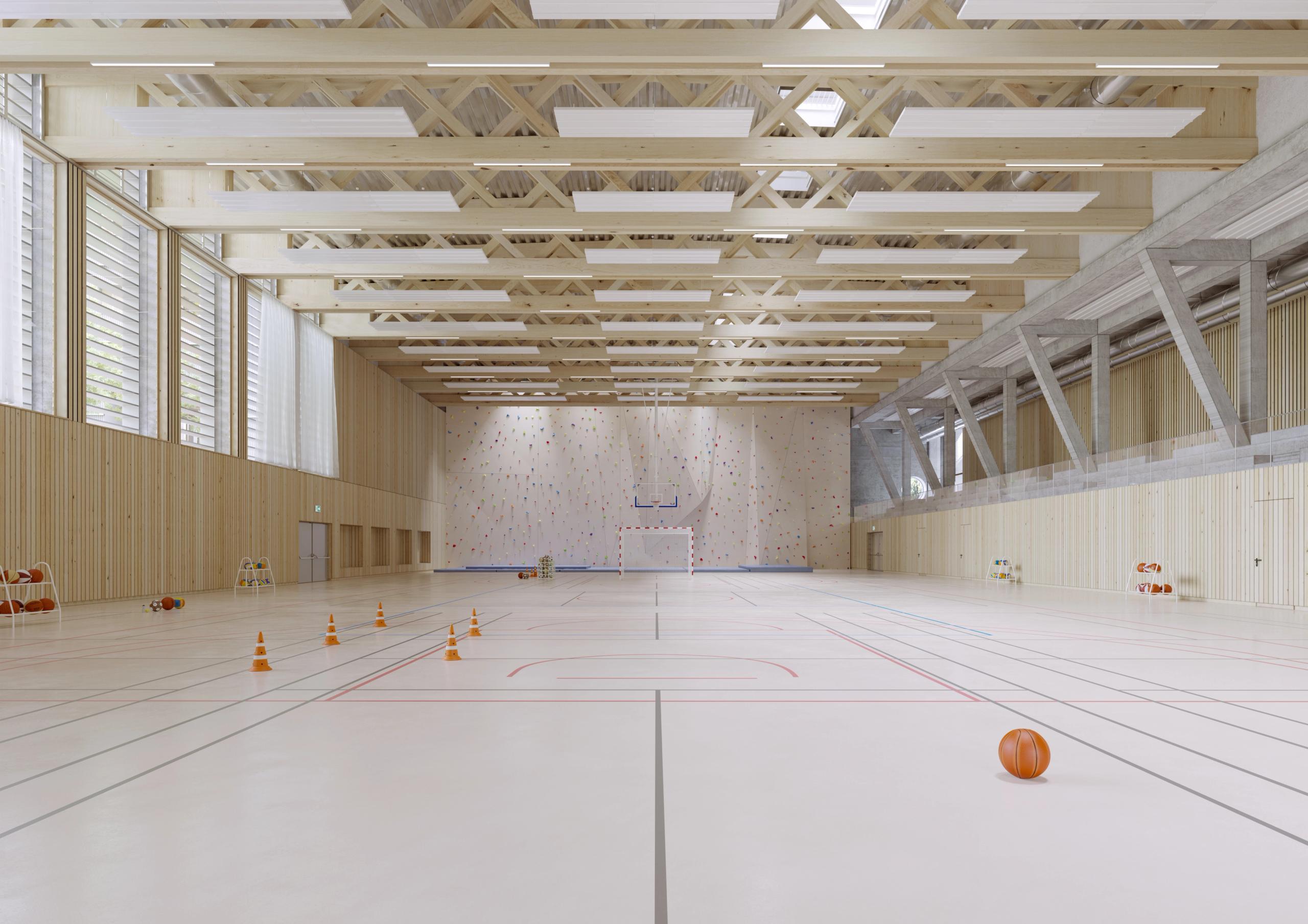 Light-filled sports hall in the E4 North block, Lyon, with timber trusses, glazed side wall, pale multi-sport floor and end wall for climbing and games.