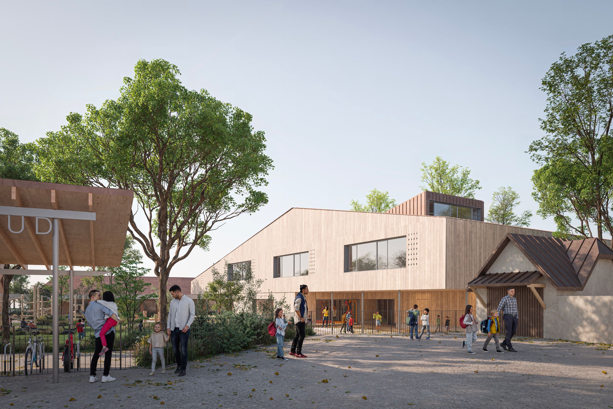 Groupe scolaire Louis Pergaud à Levier : volume compact en bardage bois, toiture à émergences et cour arborée, articulée avec le bâti existant.