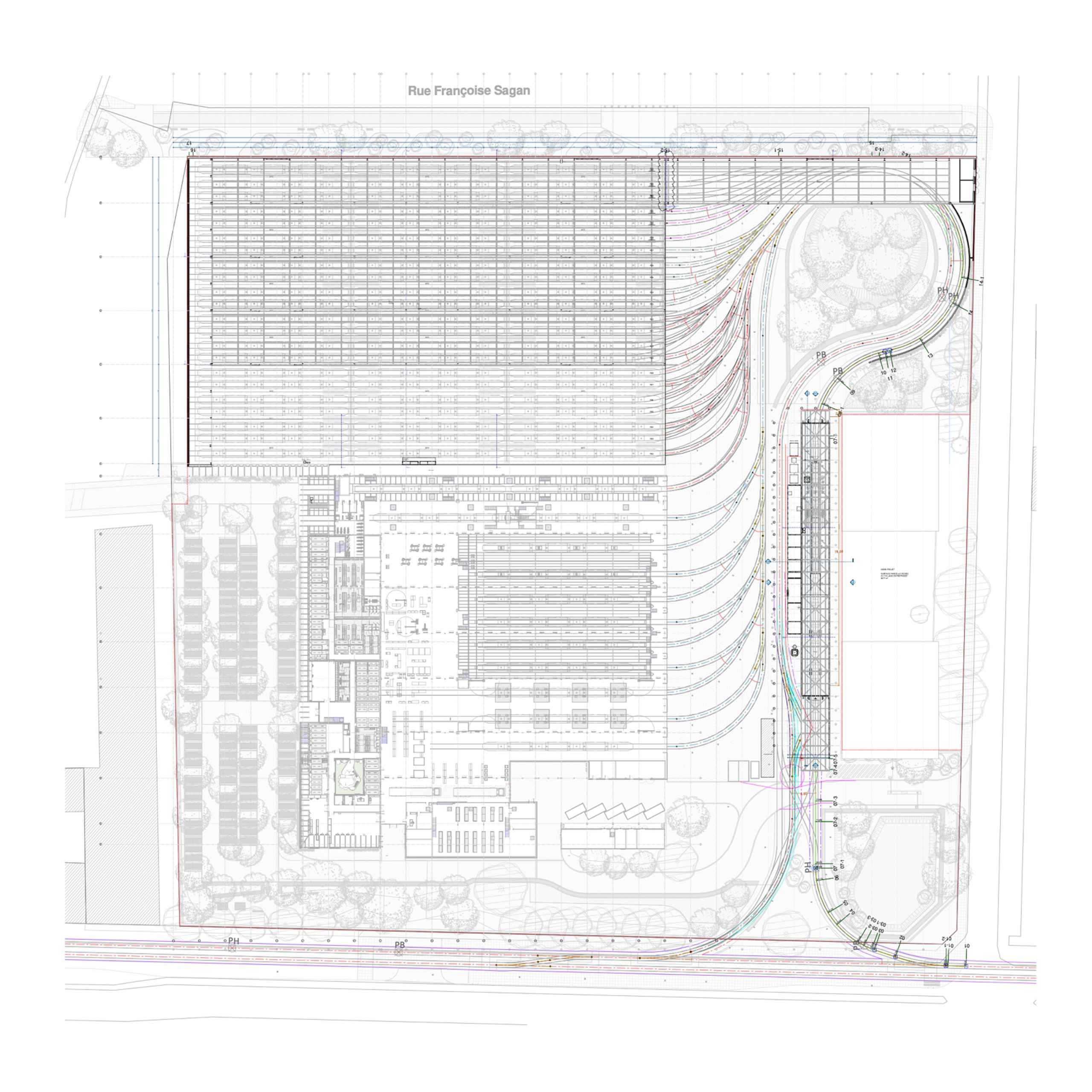 Site plan of the Lyon tramway maintenance center showing repetitive shed bays, curved tracks, service buildings and landscaped buffers on the urban block.