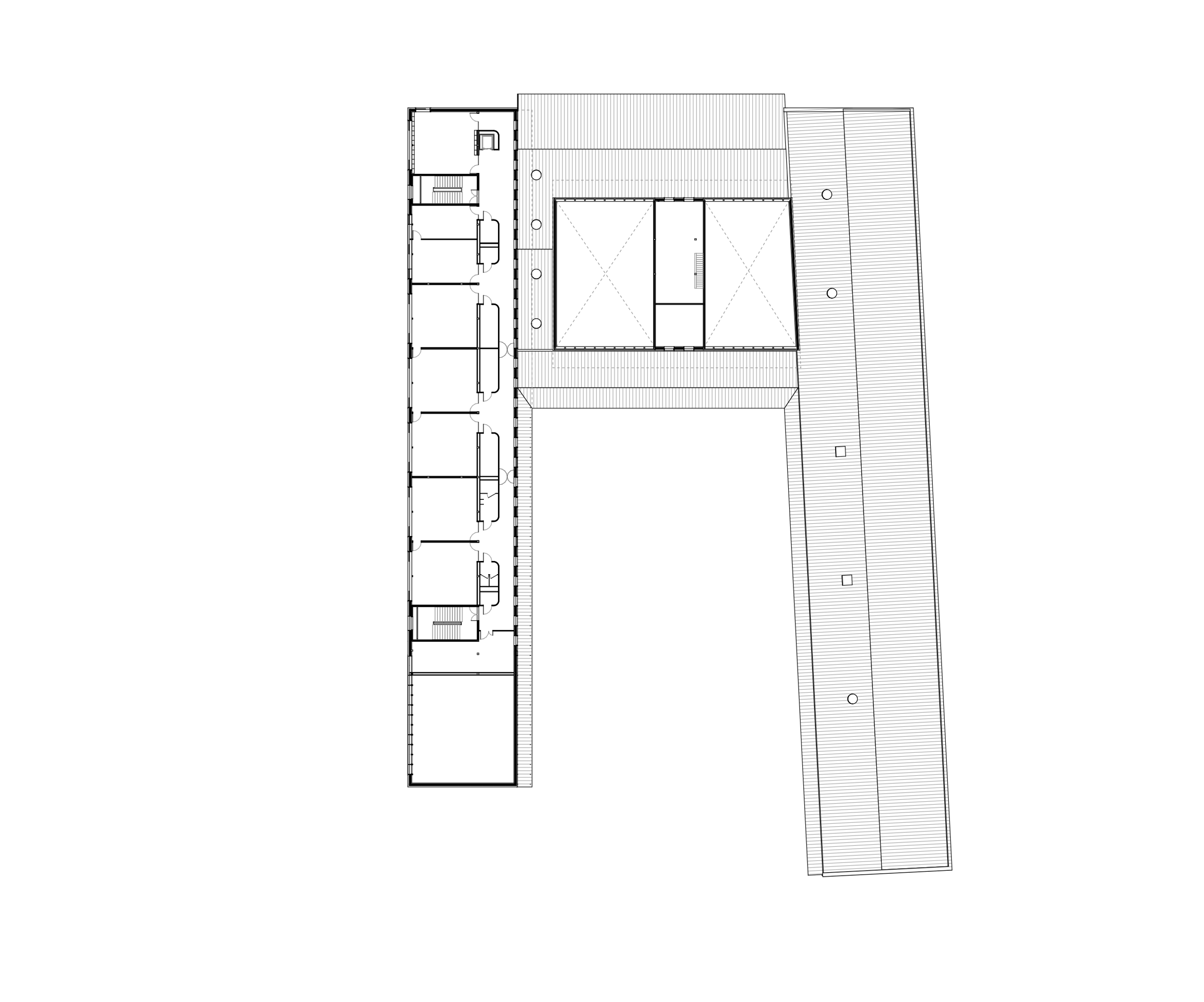 Plan en L des groupes scolaires Jacqueline Auriol et Jean Jaurès au Bourget, montrant l’ossature régulière, les salles en enfilade et la cour centrale cadrée.
