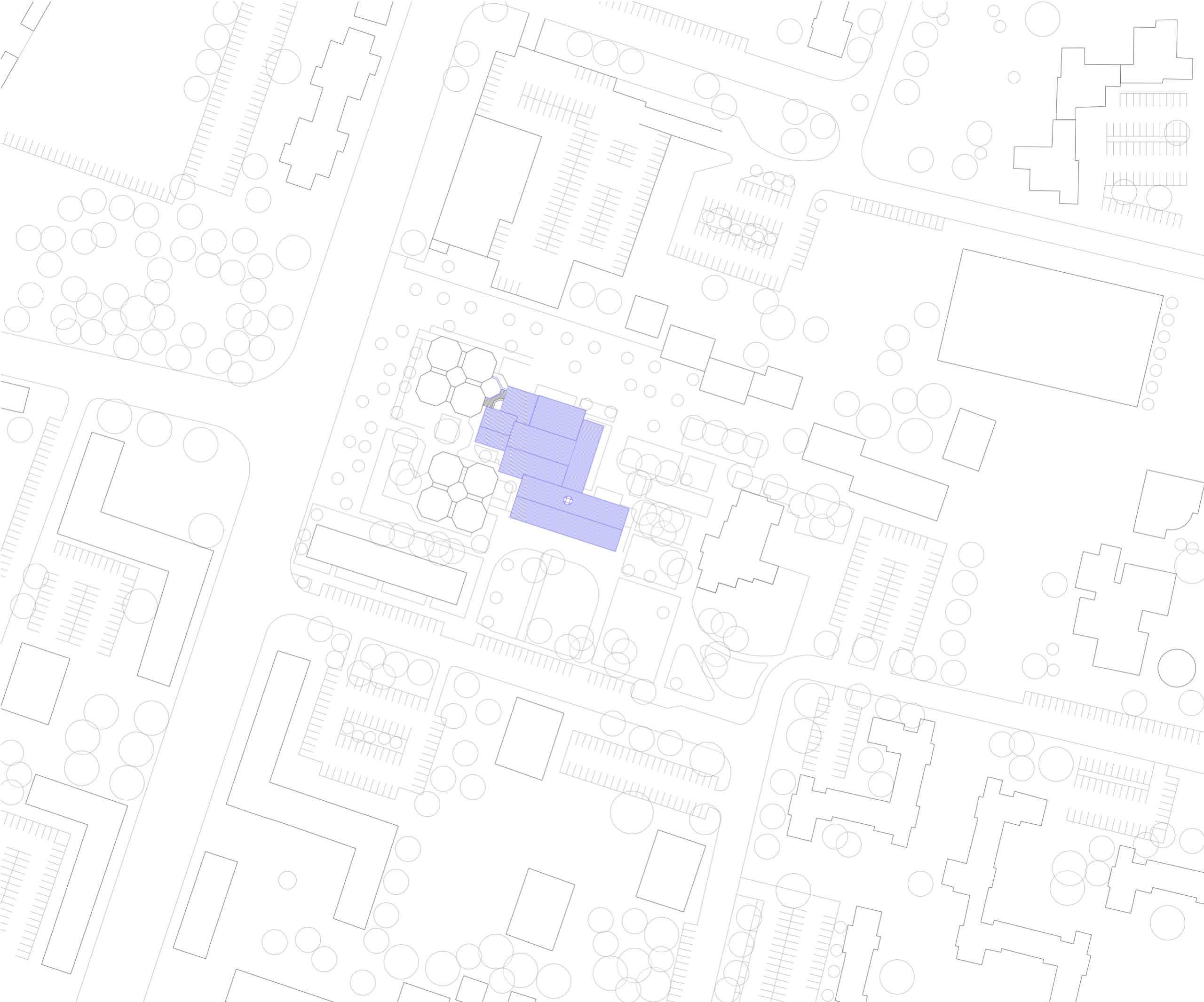 Plan masse de la réhabilitation du conservatoire intercommunal d’Annemasse, bâtiment en bleu inscrit dans un site arboré et résidentiel.