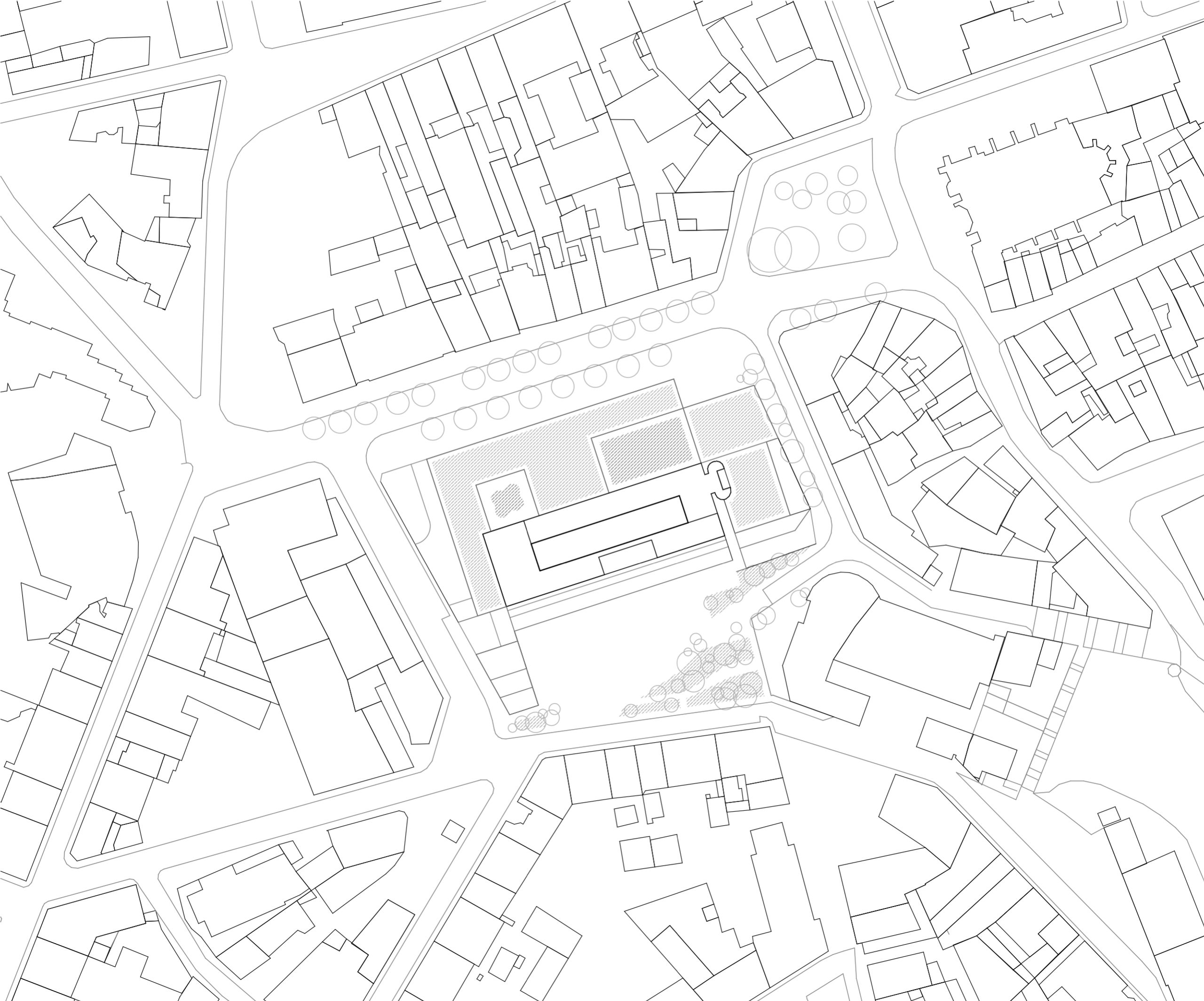 Plan masse du projet de réhabilitation de l’IGH Émile Loubet à Saint-Étienne, montrant le socle allongé, la tour et leur insertion dans le tissu urbain dense.