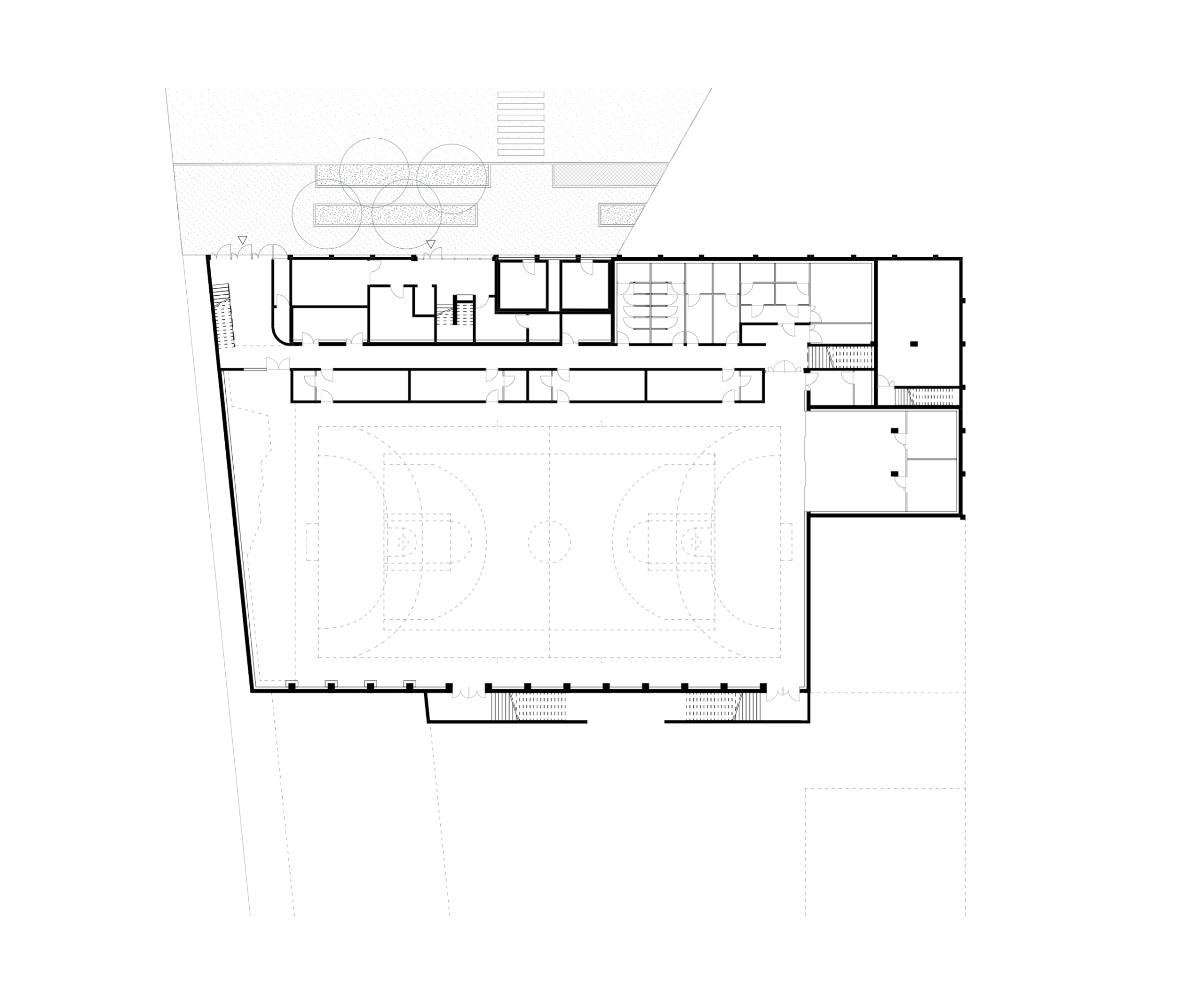 Ground plan of the semi-underground sports hall in the E4 North block, Lyon, showing the main court, changing rooms, service areas and garden access.