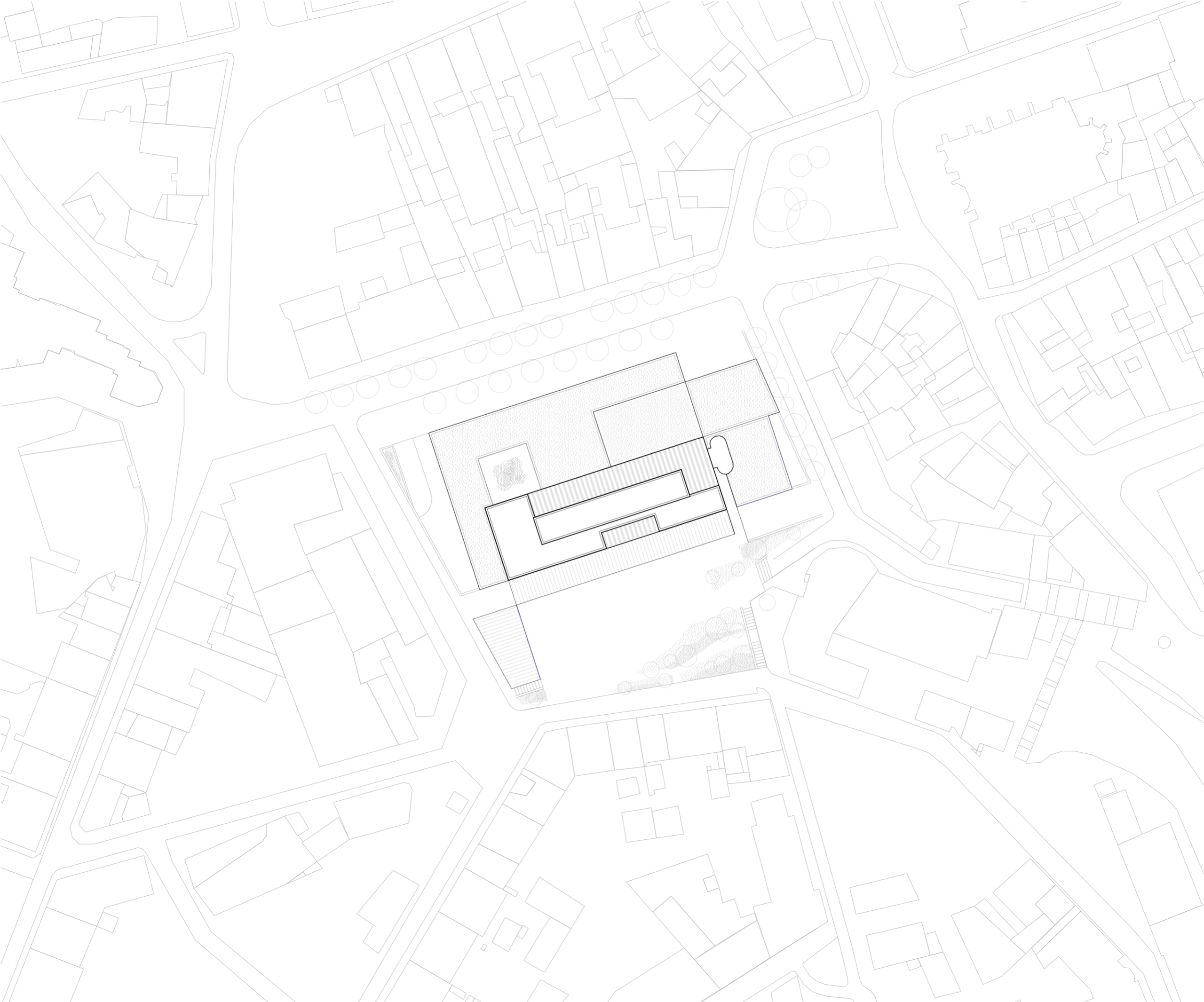 Plan masse du projet de réhabilitation de l’IGH Émile Loubet à Saint-Étienne, montrant le socle allongé, la tour et leur insertion dans le tissu urbain dense.