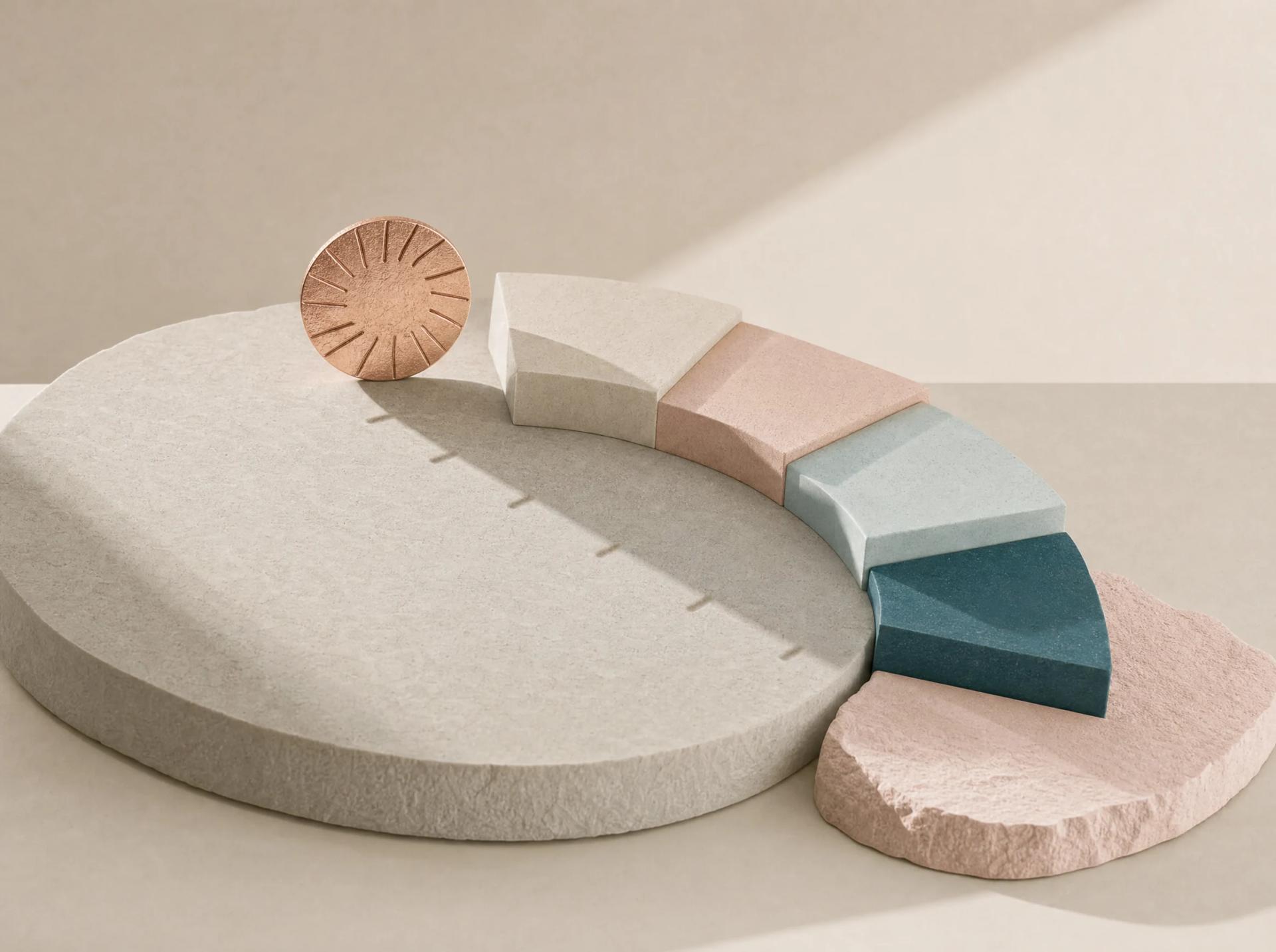 A circular working surface divided into balanced blush, teal, cream, and mist-blue phases.