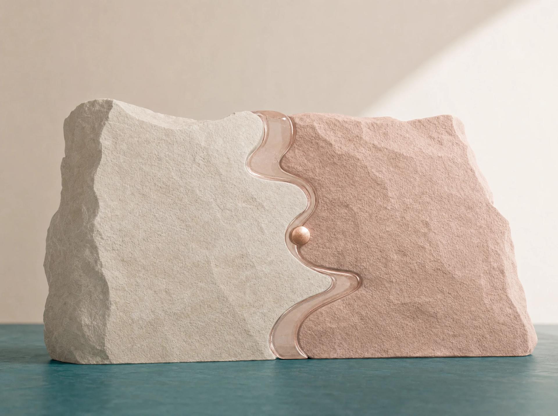 Two complementary mineral profiles joined along a negotiated blush seam.