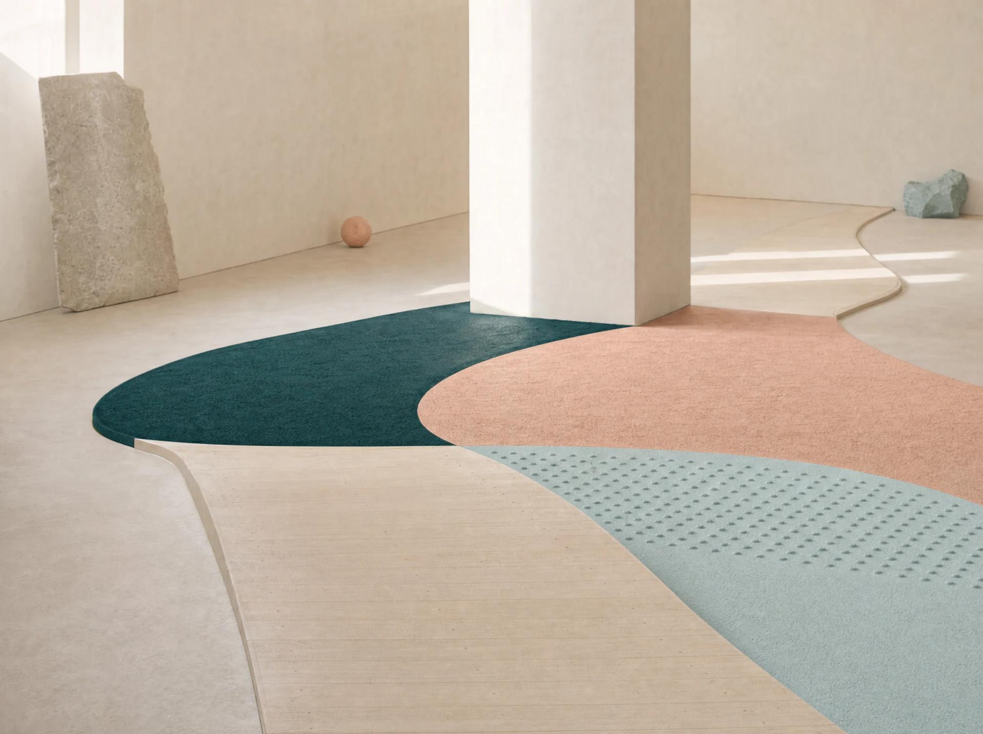 Continuous route curves through cream, teal, blush and textured blue surfaces between pale architectural barriers.